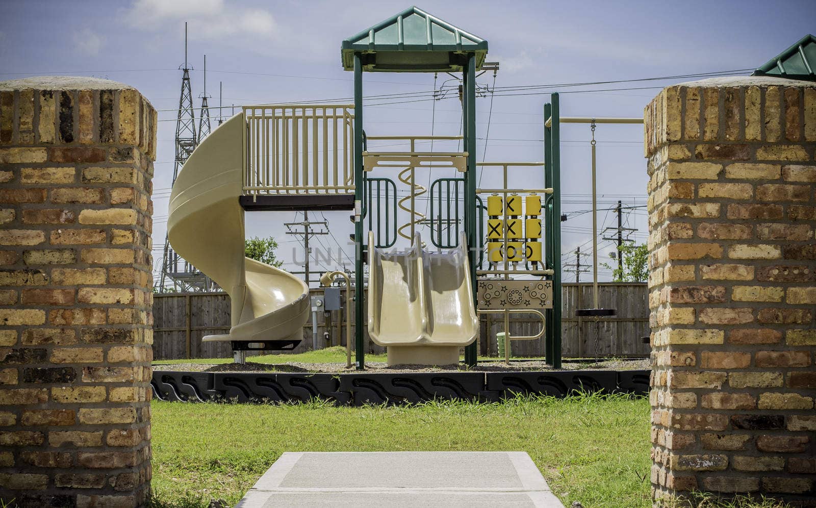 Framed picture of a neighborhood playground for children.