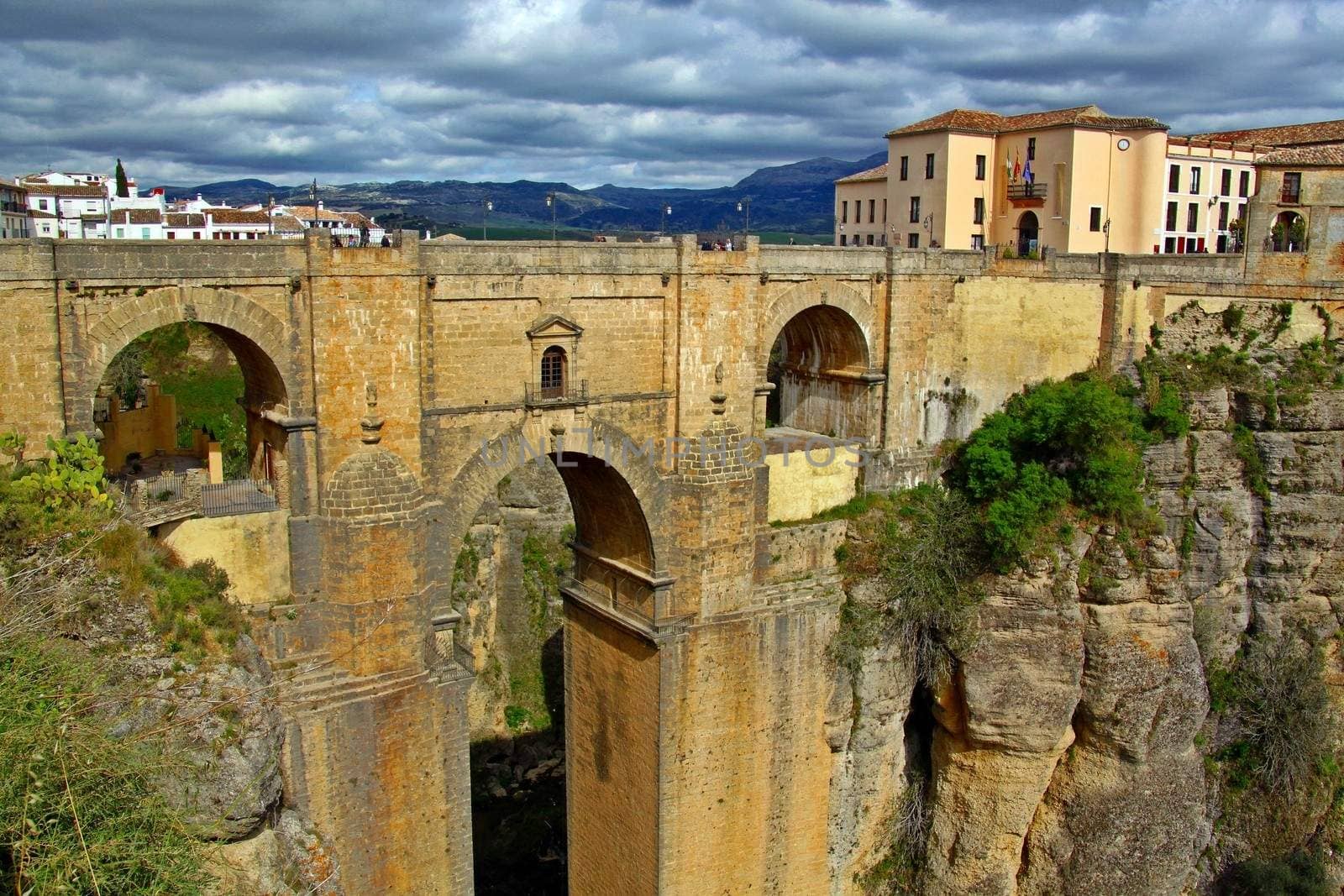 A scenic landscape of the old Roman bridge in Ronda, Andalucia, Spain