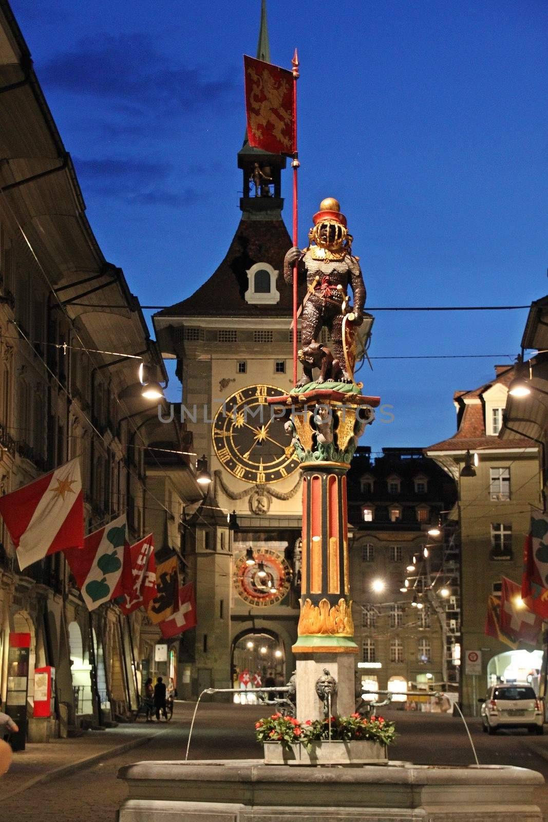 The historic picturesque centre of Berne, Switzerland with the town clock tower at dusk