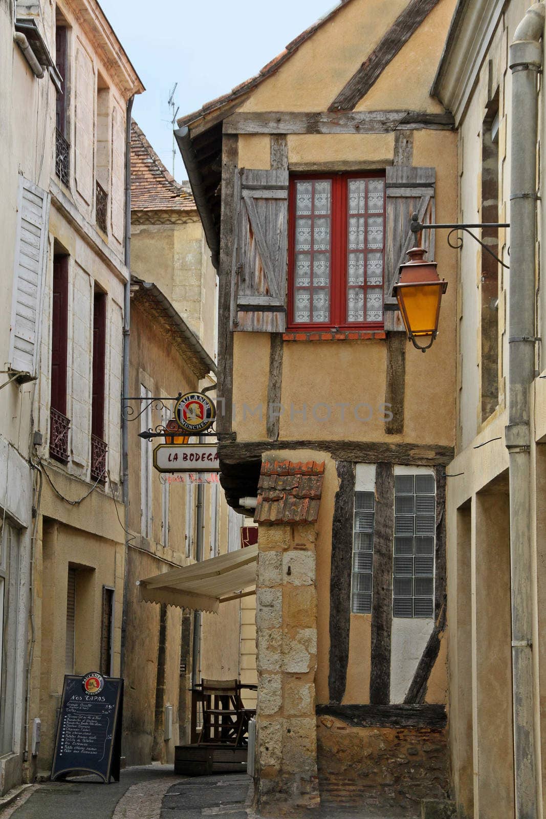 Bergerac, France, circa June 2011 Ancient houses from the XV century in the town of Bergerac, France turned into restaurant. Popular tourist destination during the summer.