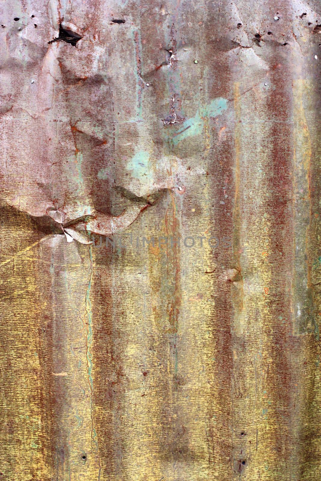 A rusty damaged corrugated iron metal texture by nuchylee