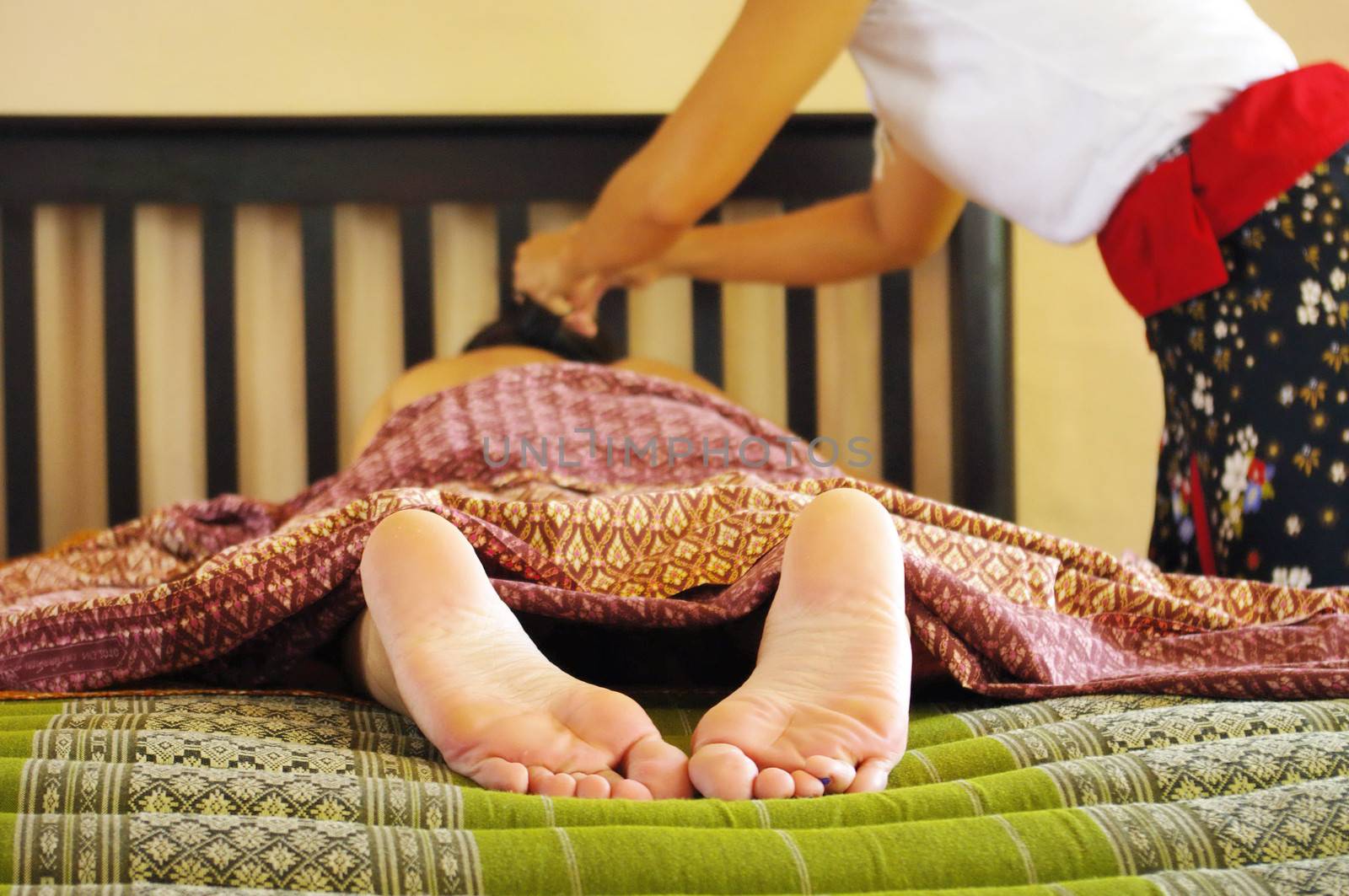 Foot massage in Thai style, Reflexology concept