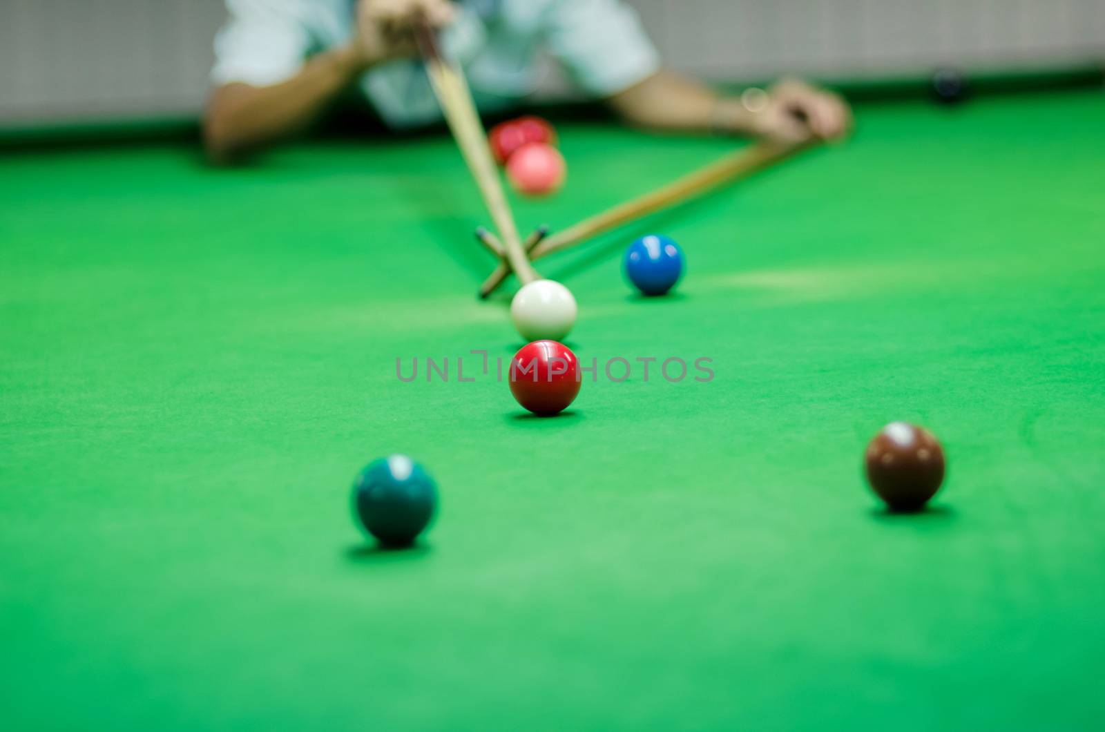 a man playing snooker game