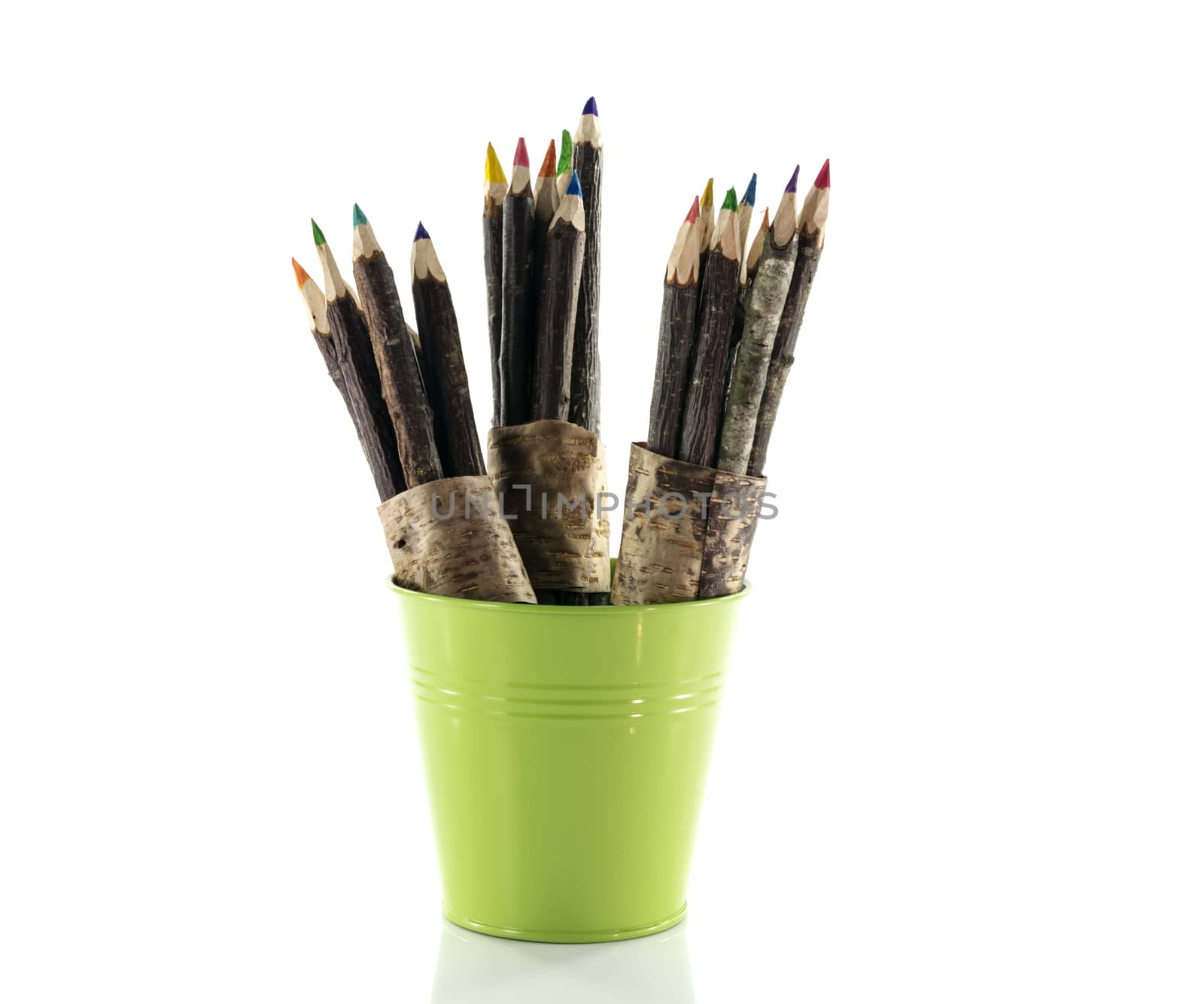 original wooden pencils in green orange and yellow in container