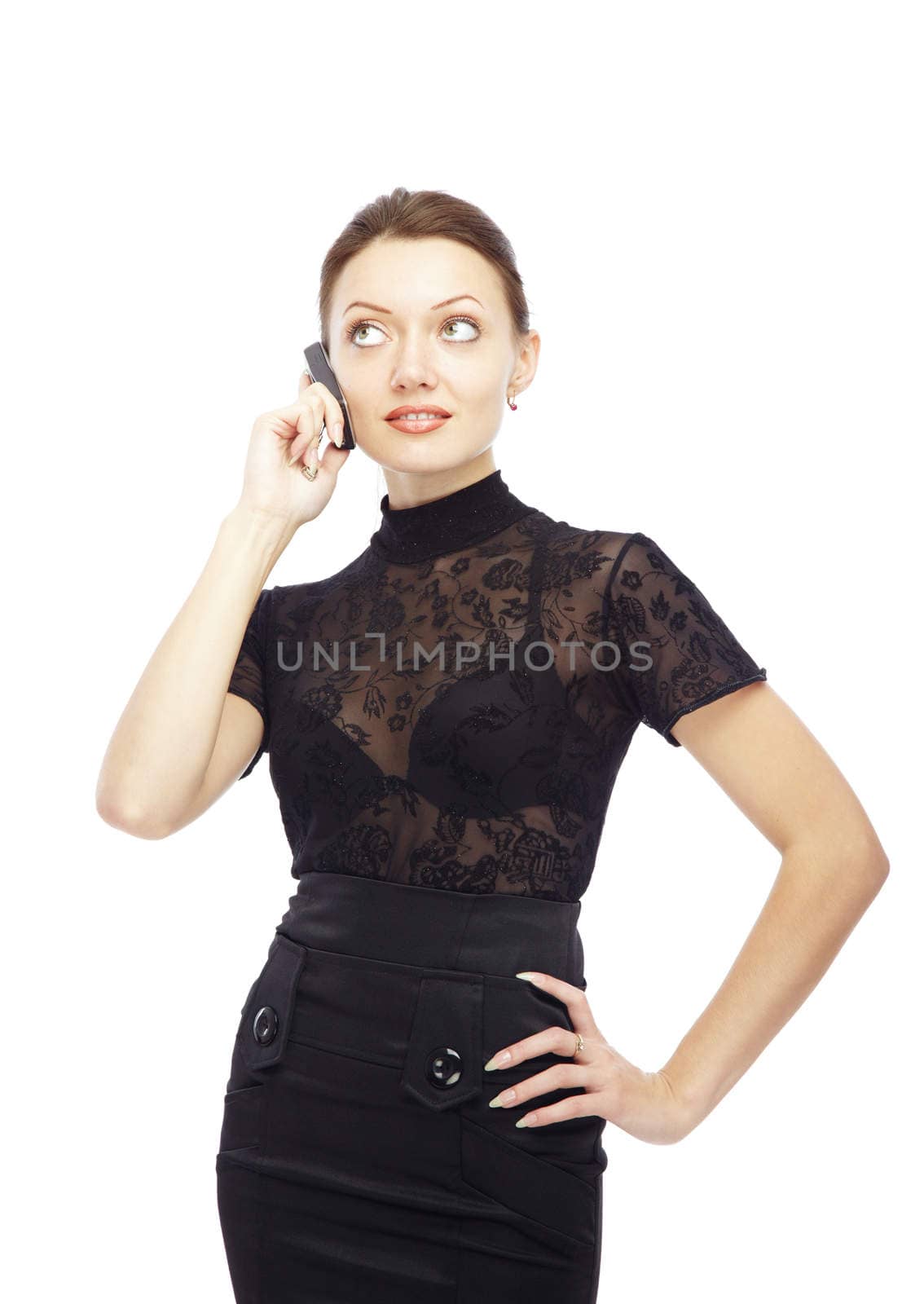 Woman on a white background talking via cellular phone