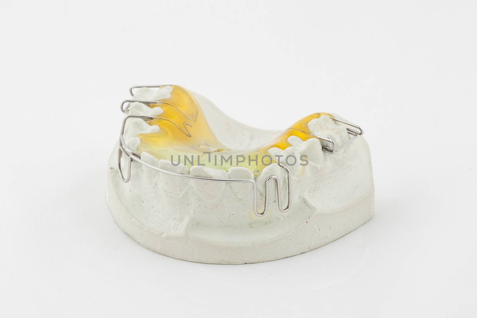 Dental plate on white background