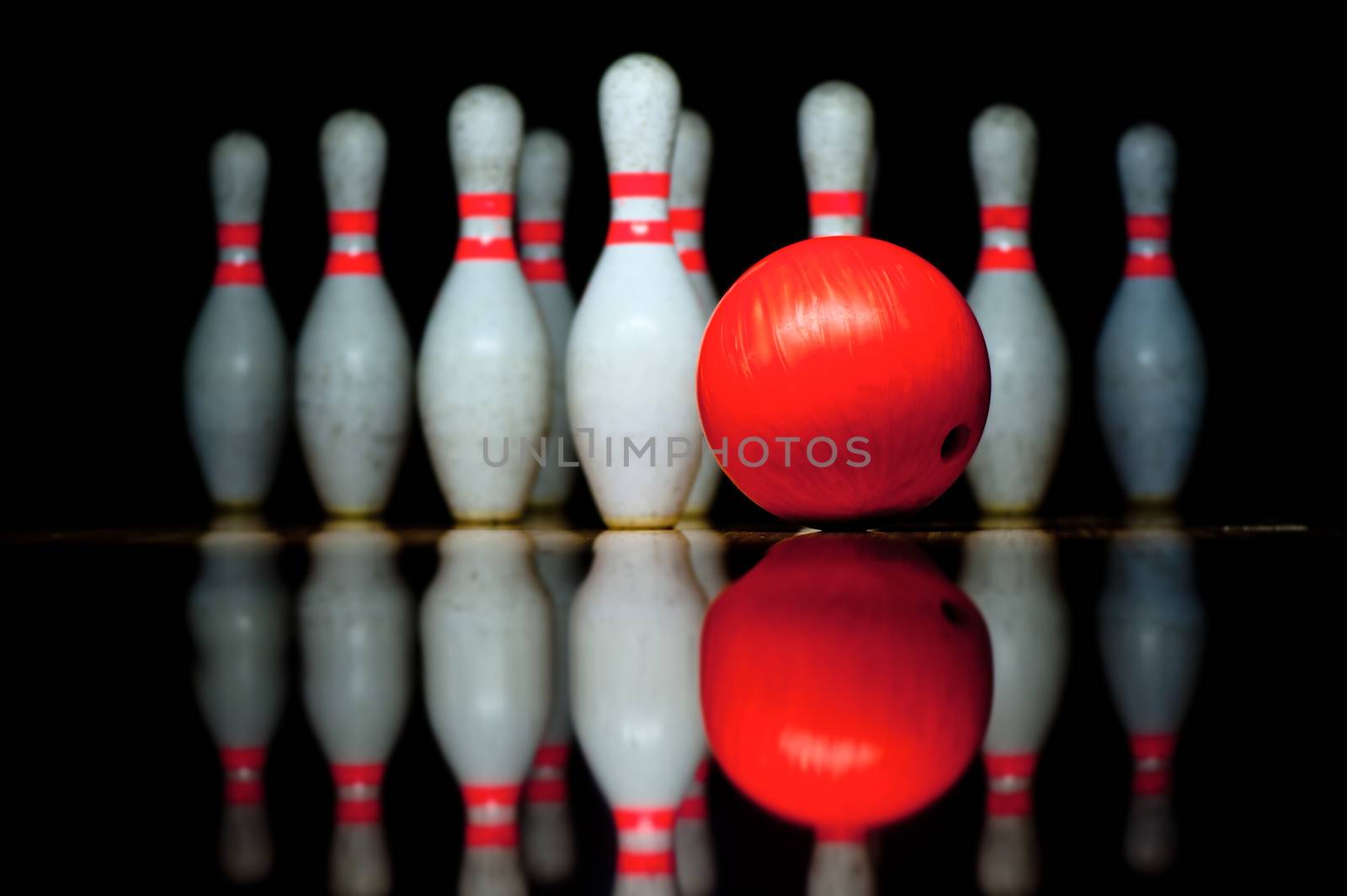 Ten bowling pins and bowling ball