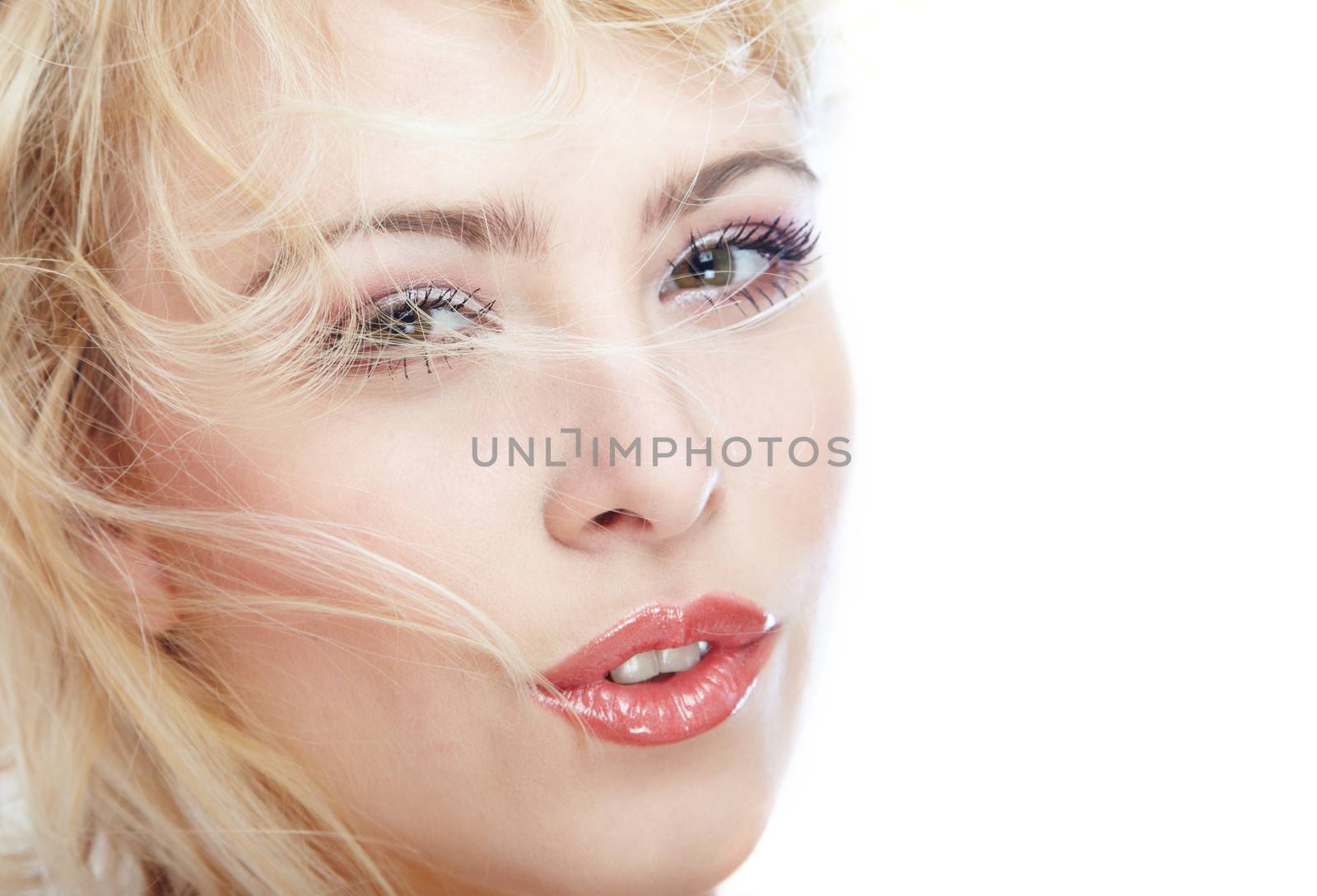 Close-up portrait of the blond lady with perfect makeup