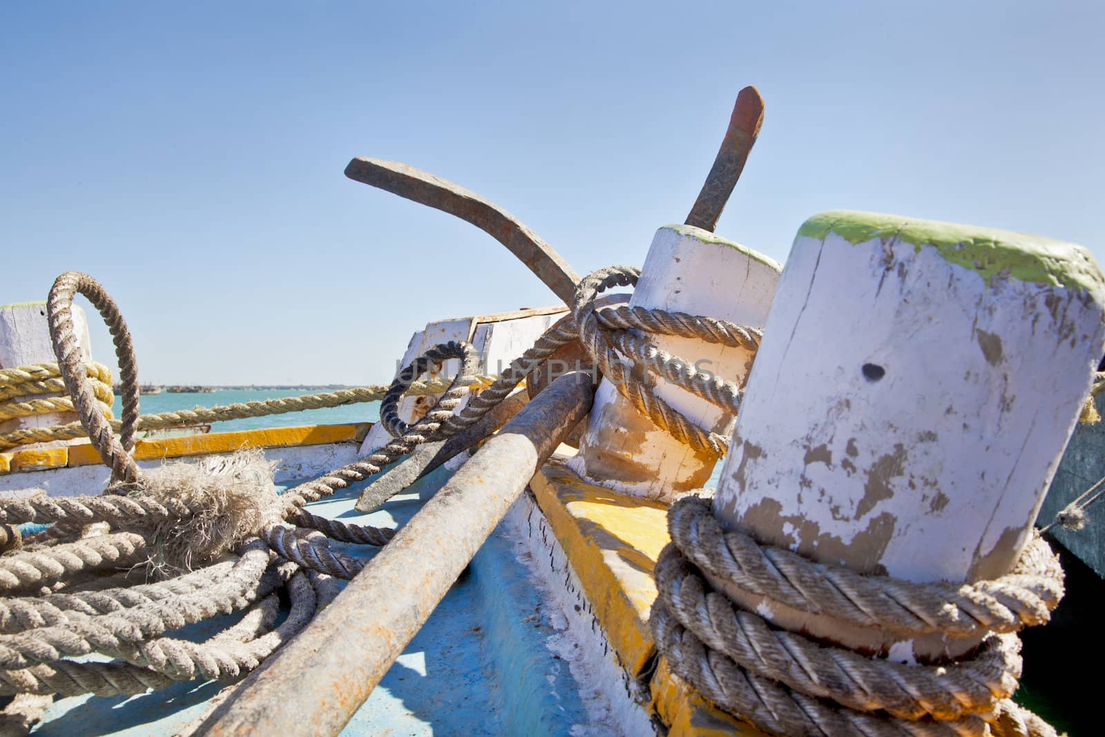 Dwarka Roadtrip. Horizontal generic capture of anchor and tie ropes on a passenger ferry from at the waterfront and quayside of Bet Dwarka in Gujarat India