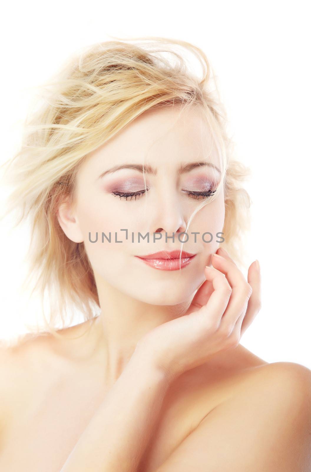 Beautiful lady with perfect skin on a white background