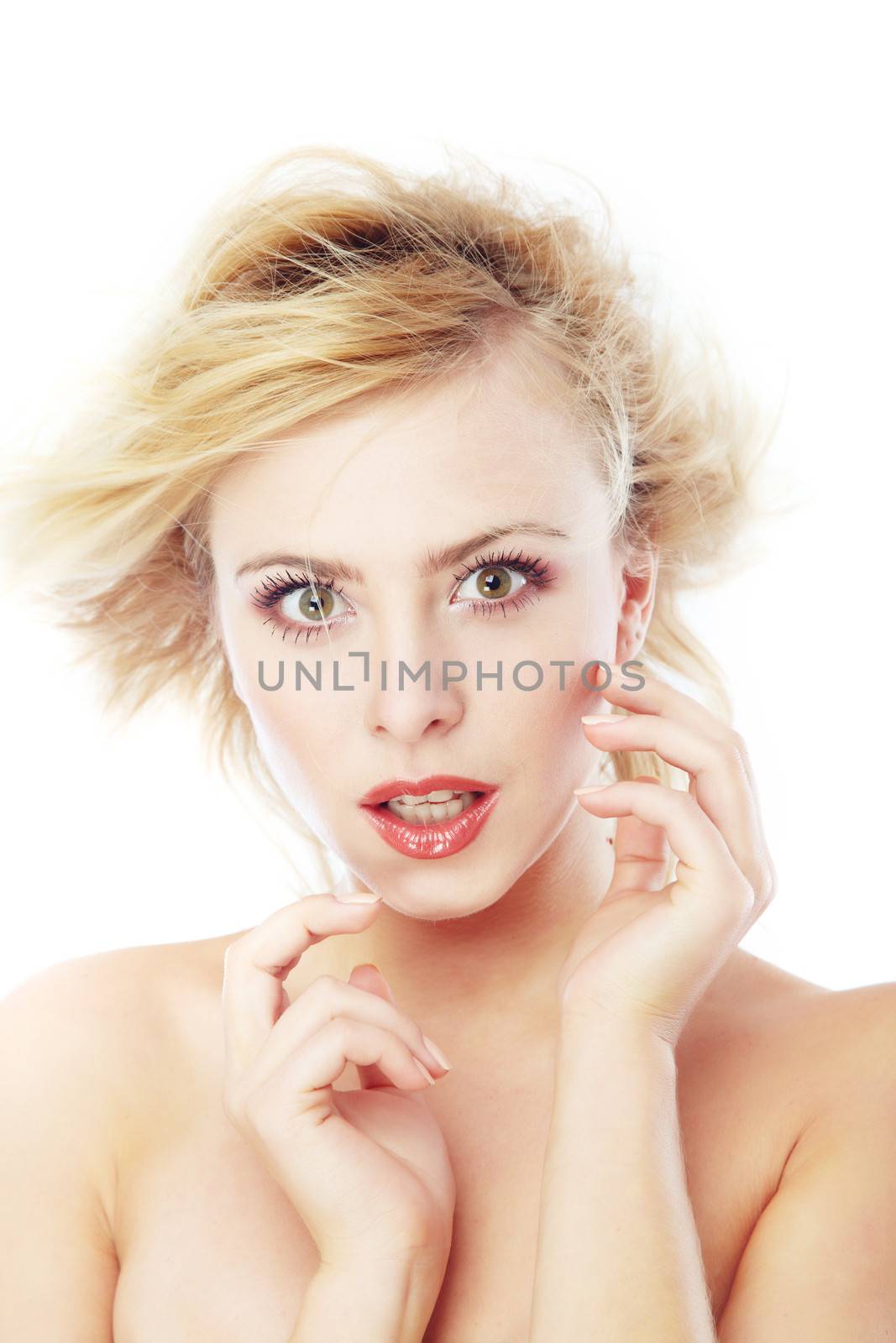 Beautiful blond lady with perfect makeup on a white background