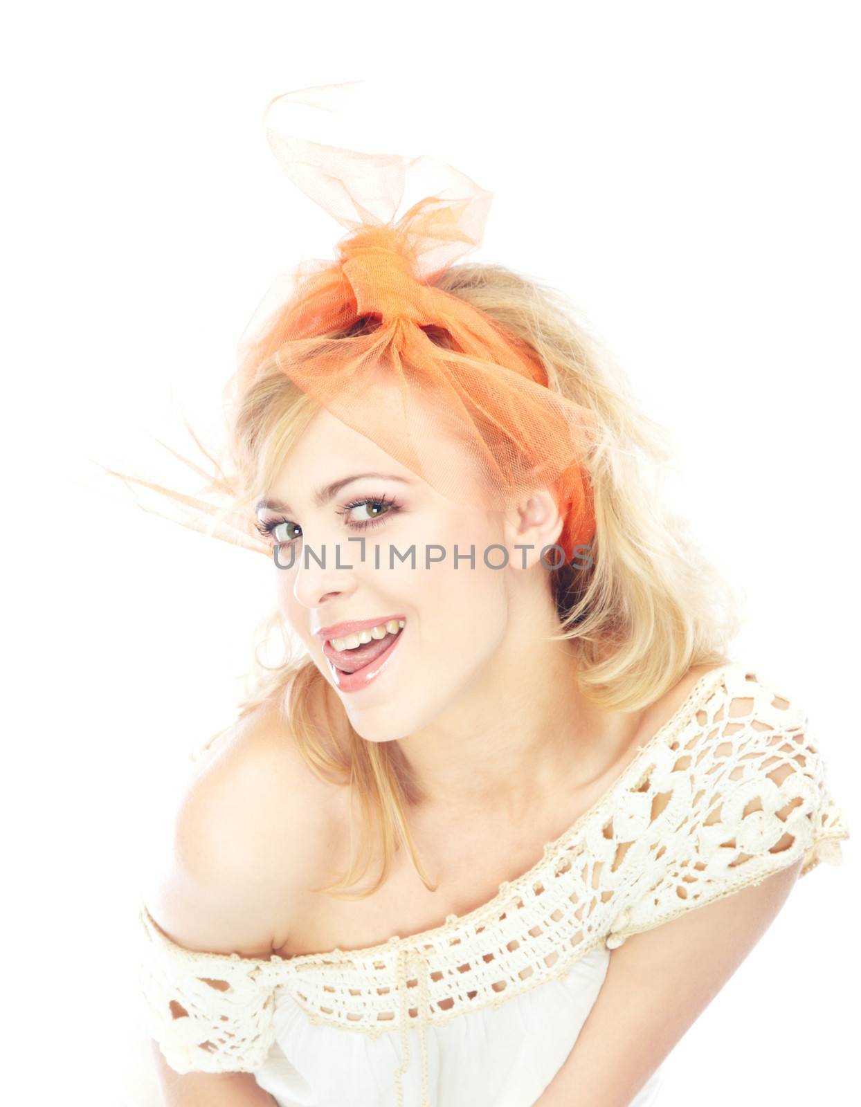 Young blond lady flirting on a white background