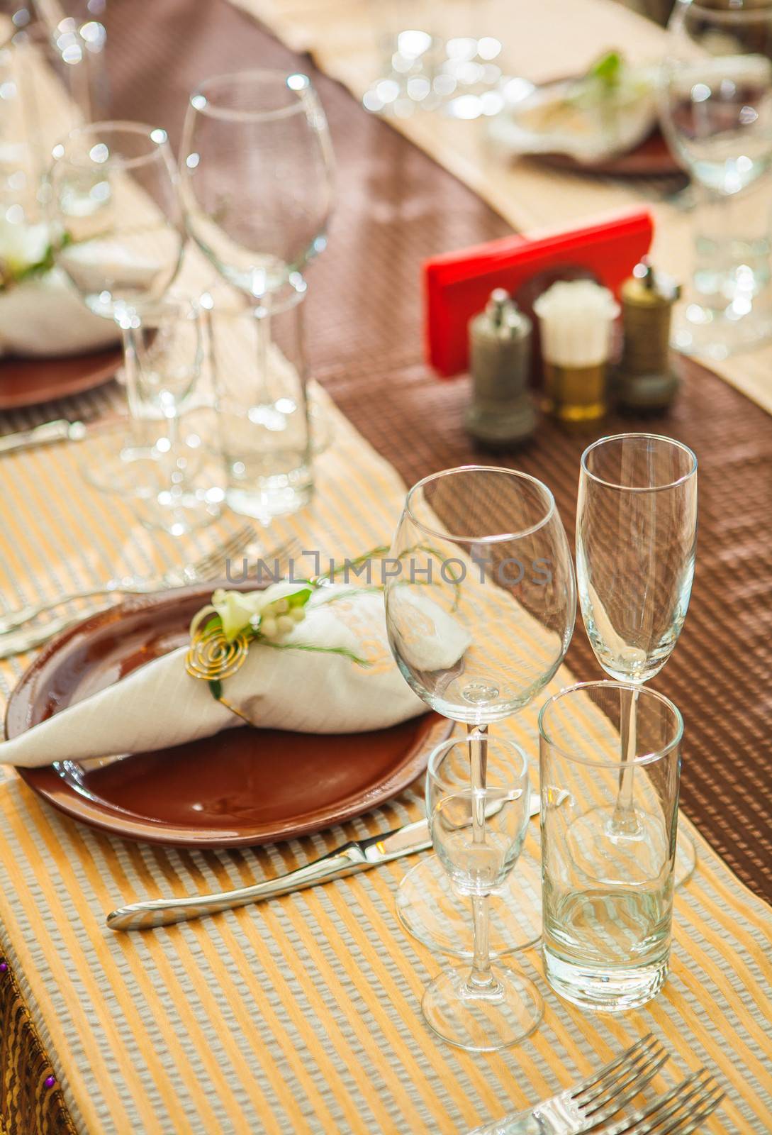 empty kitchen glassware on dinner table