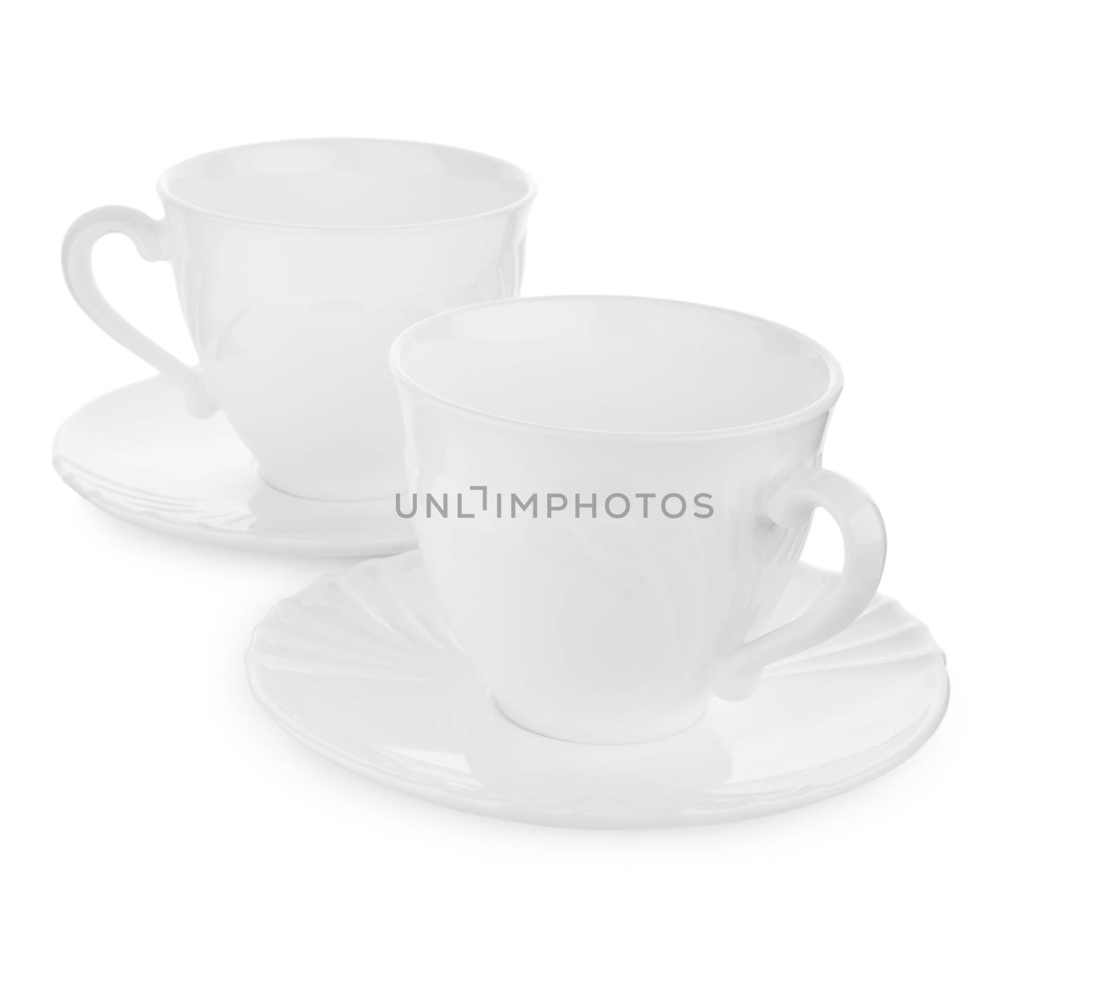 two cups on a plate isolated