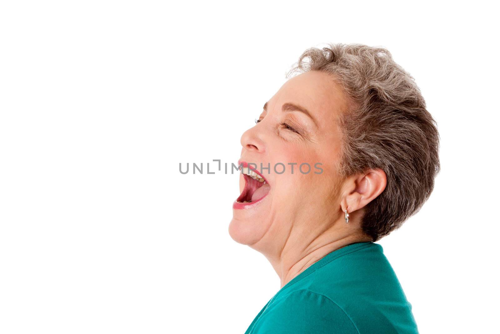 Happy senior woman talking screaming yelling singing with mouth open, isolated.