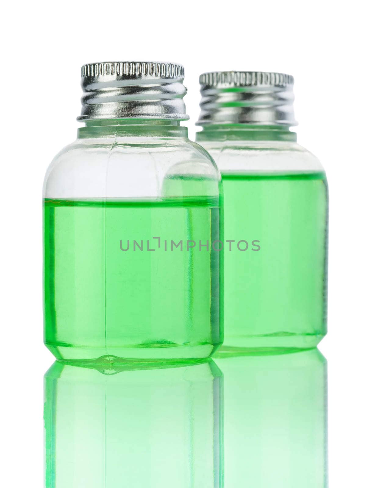 plasticals bottle with green liquid