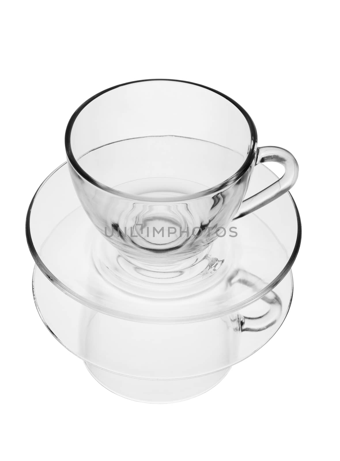 transparent cup on a plate with reflection isolated