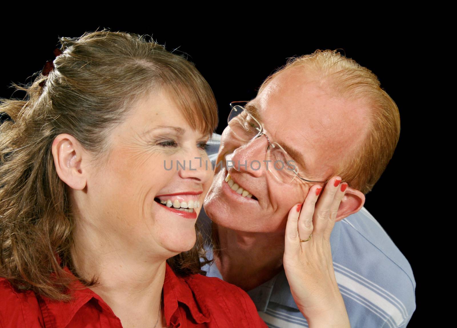 Middle Aged Couple Having Fun by jabiru