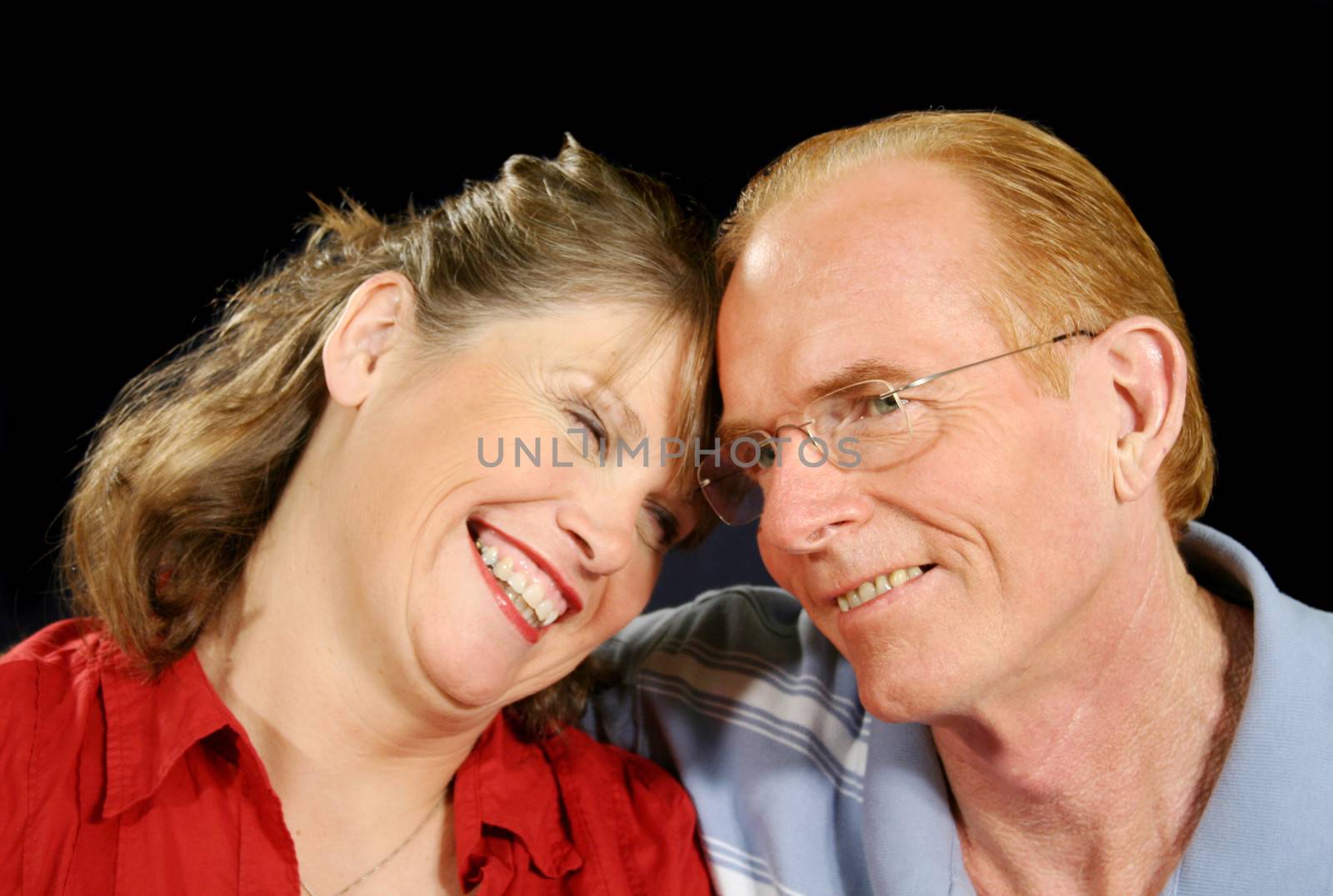 Middle aged couple enjoying each other's company.