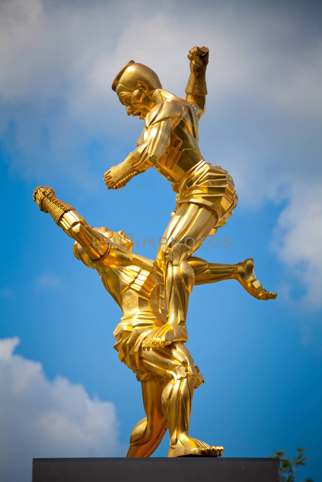 Monument thai boxing on blue sky in Thailand