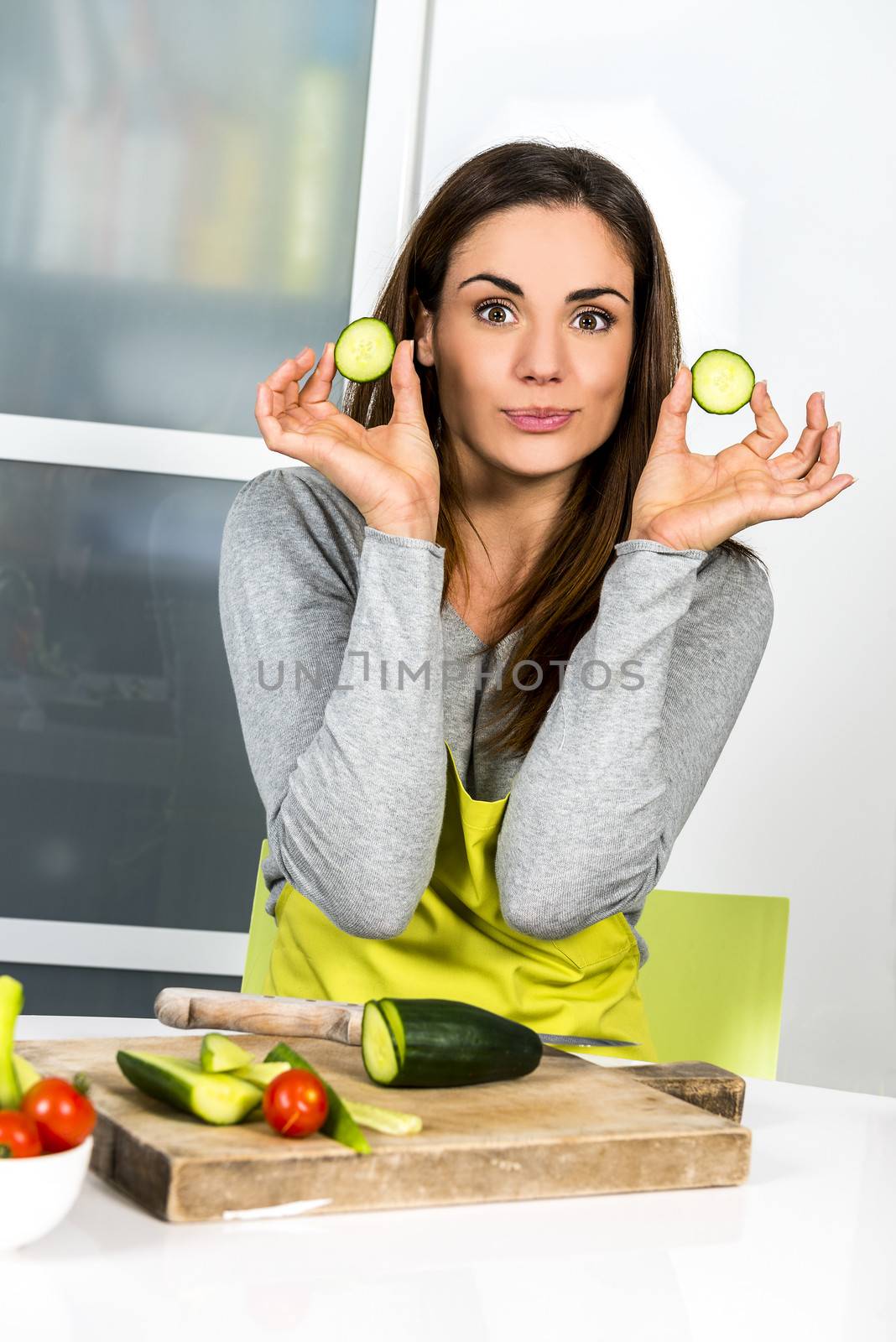 Young Woman Cooking. Healthy Food - Vegetable Salad. Diet. Dieting Concept. Healthy Lifestyle. Cooking At Home. Prepare Food 