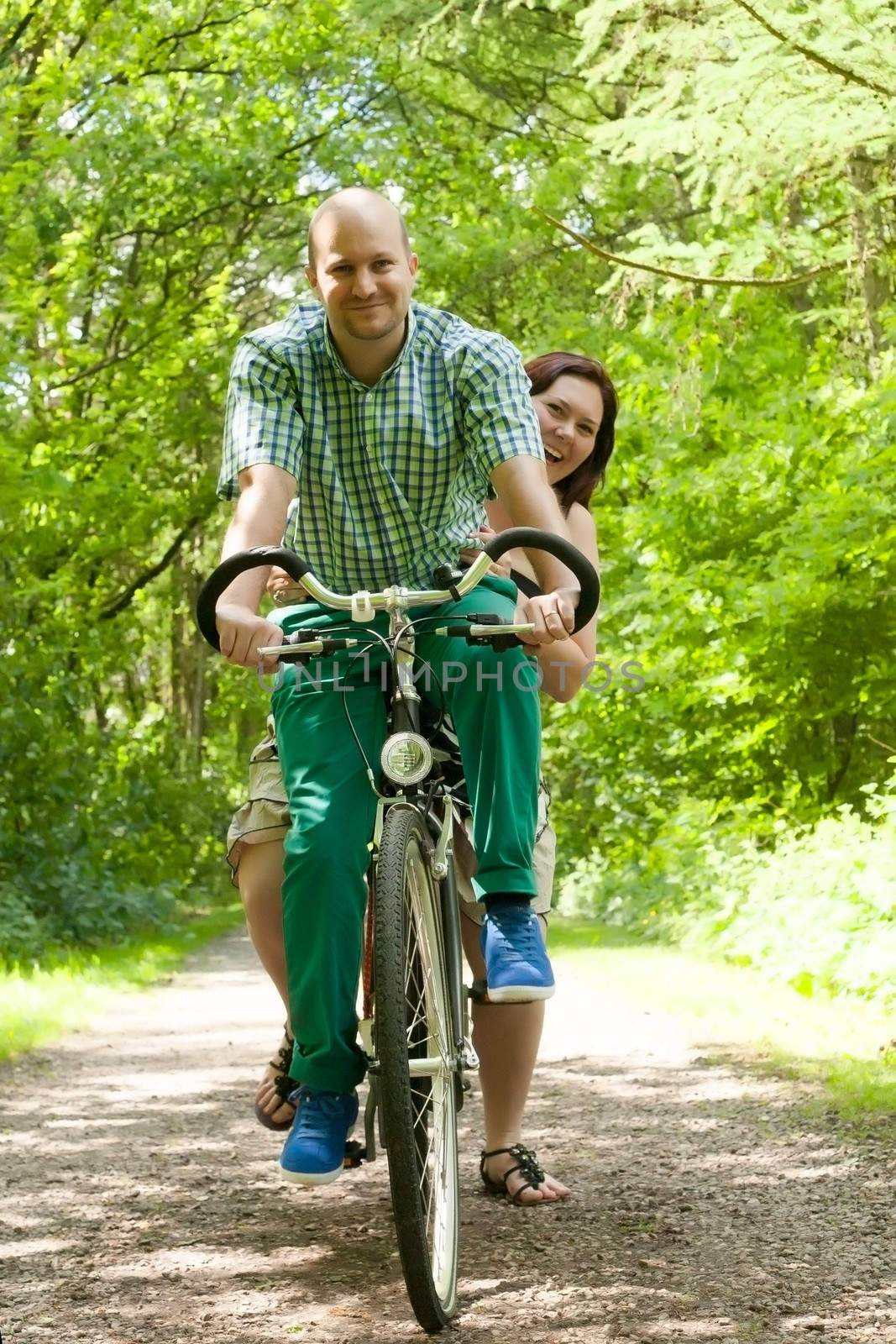 Married couple on a bike by DNFStyle