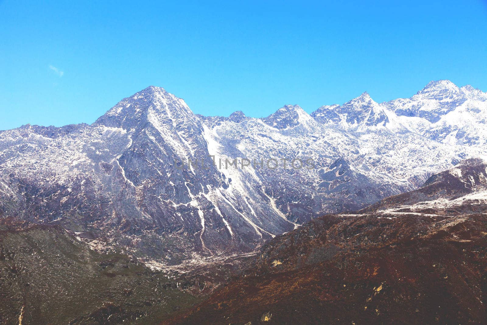 Top of High mountains, covered by snow. Kangchenjunga, India.