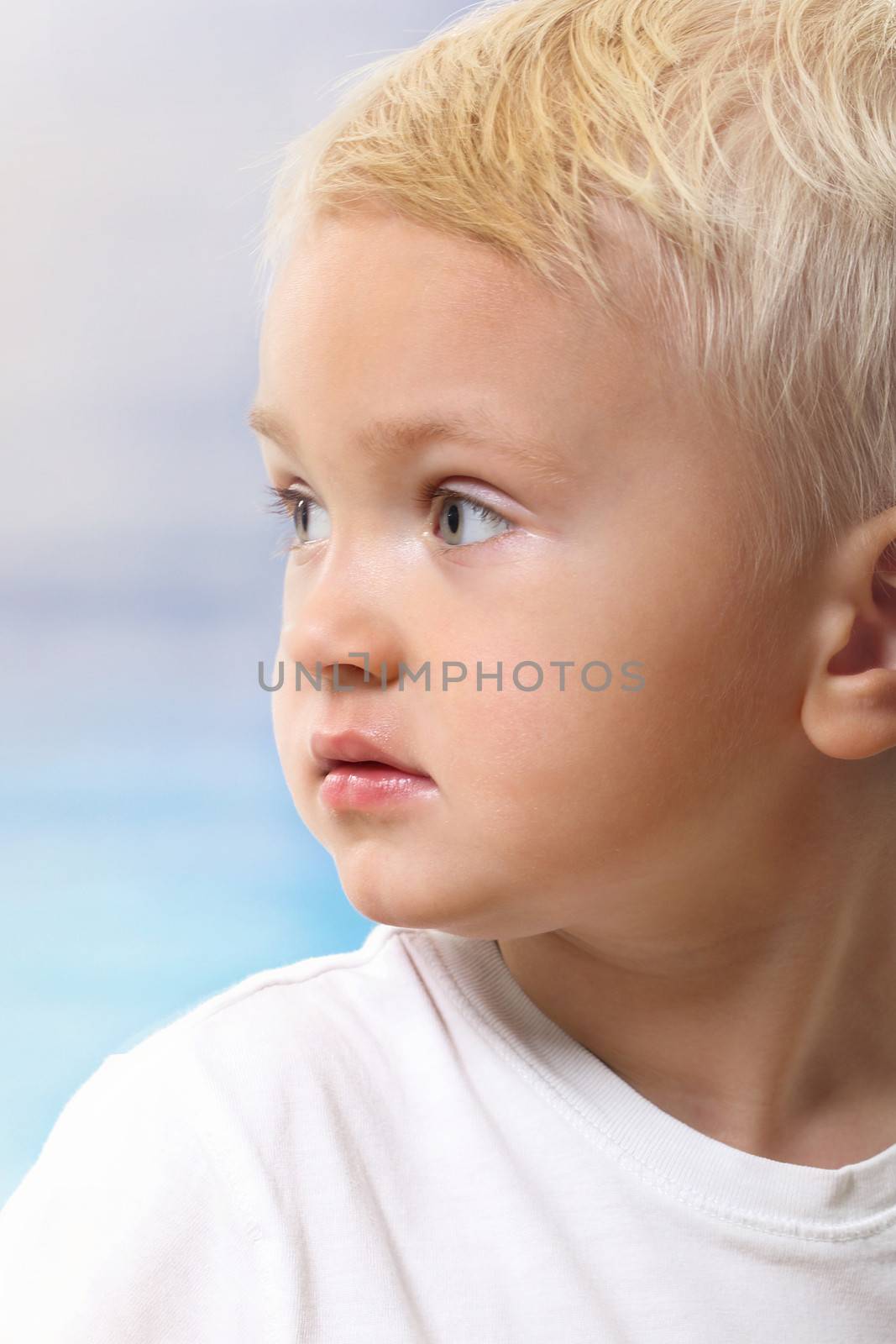 Beautiful little boy on the beach by robert_przybysz