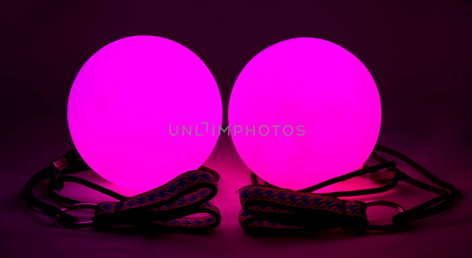 equipment for juggling - red luminous poi balls