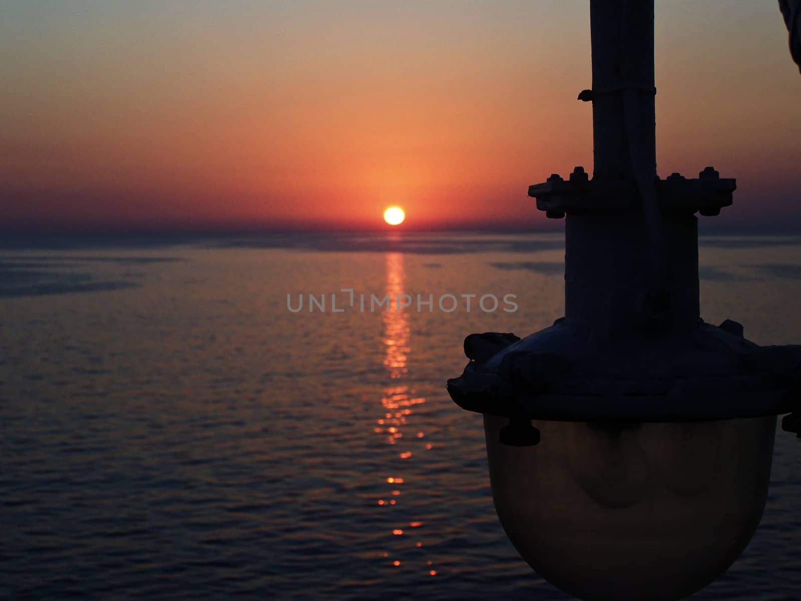 sunset on a ferry by gandolfocannatella