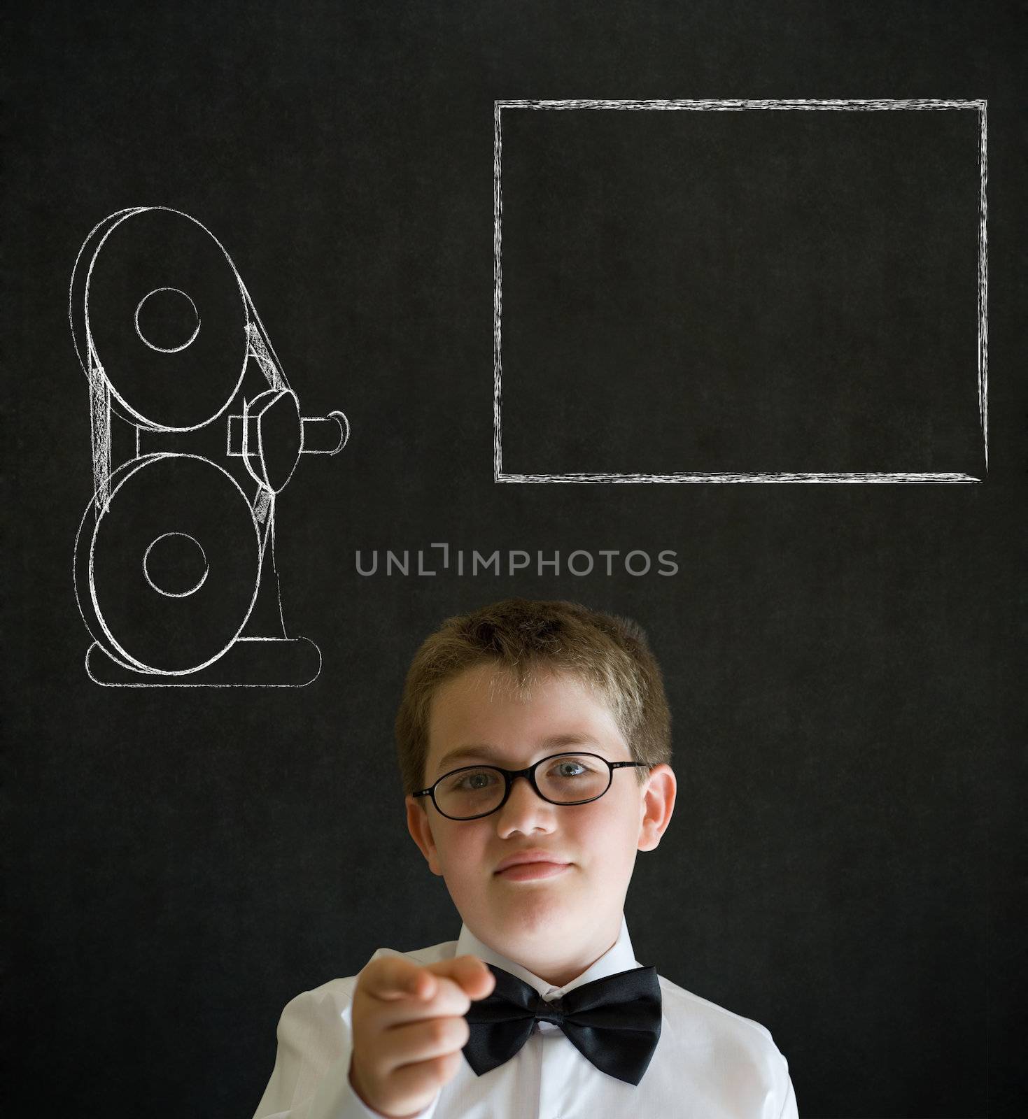 Education needs you thinking boy dressed up as business man with retro chalk film projector on blackboard background