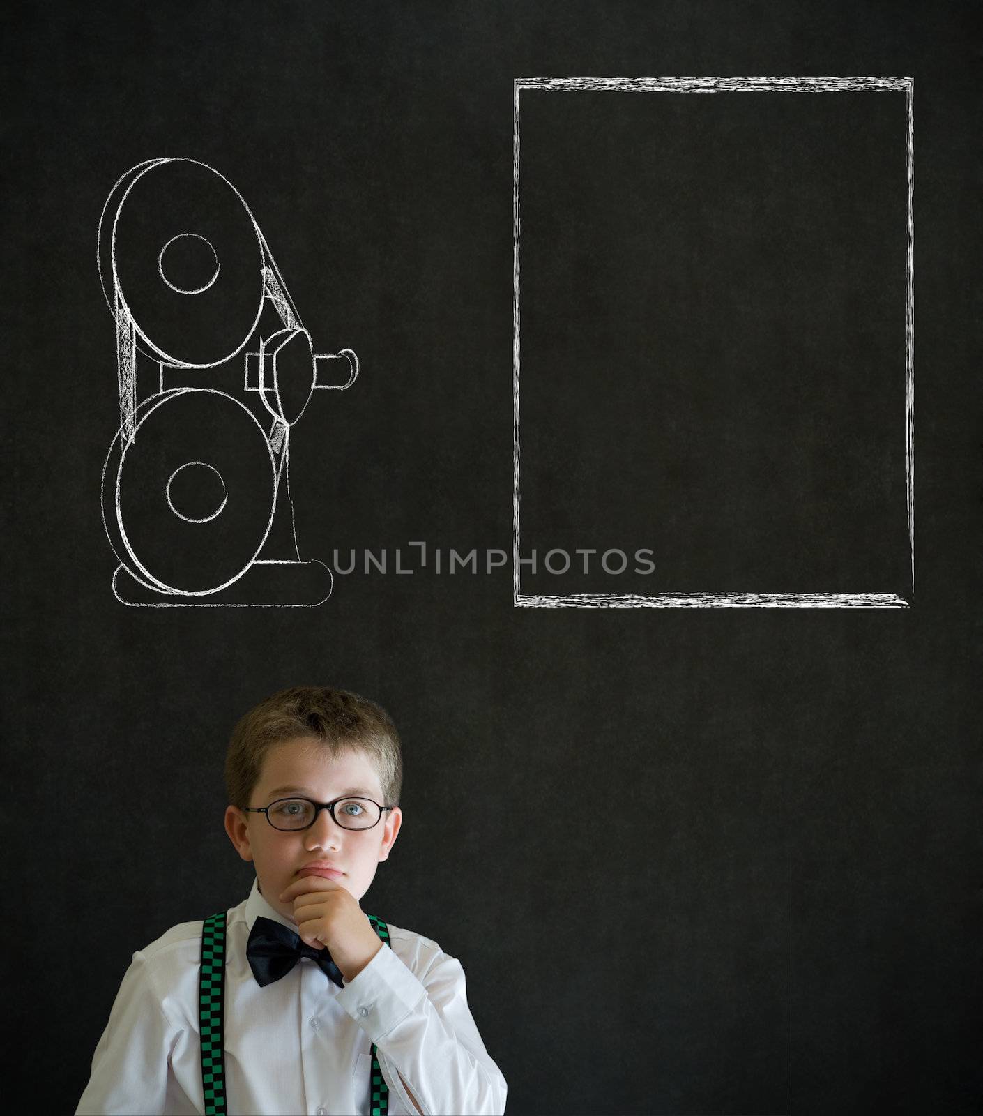 Thinking boy business man with retro chalk film projector by alistaircotton