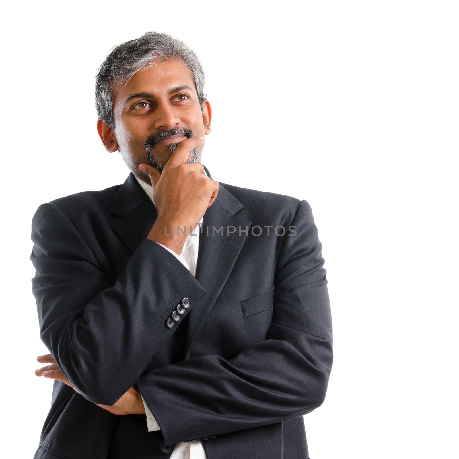 Indian businessman thinking. Attractive mature gray hair Indian business man thinking, isolated on white background. Handsome Asian India model.
