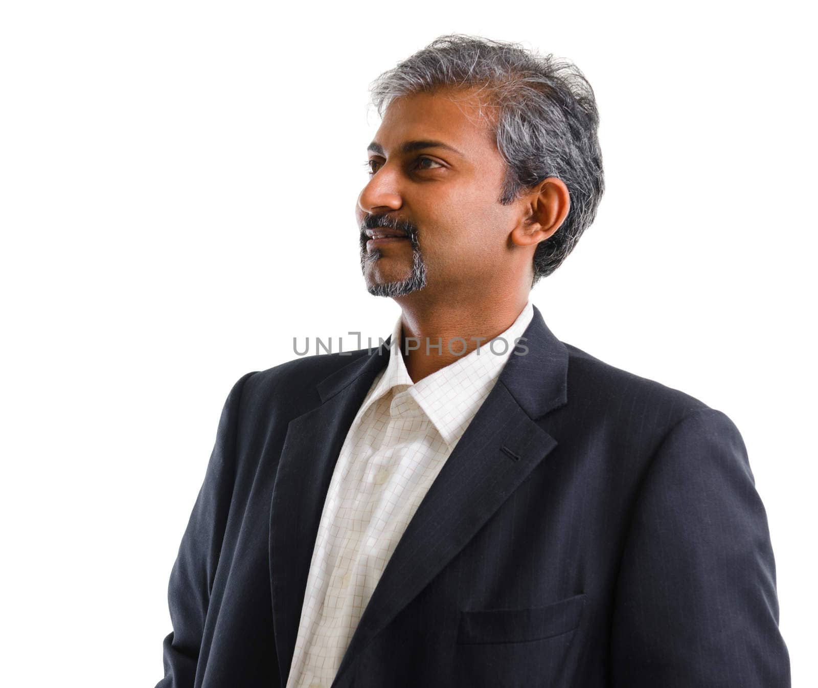 Good looking mature Asian Indian business man with business suit looking at side, isolated on white background. Portrait of handsome Indian male model.