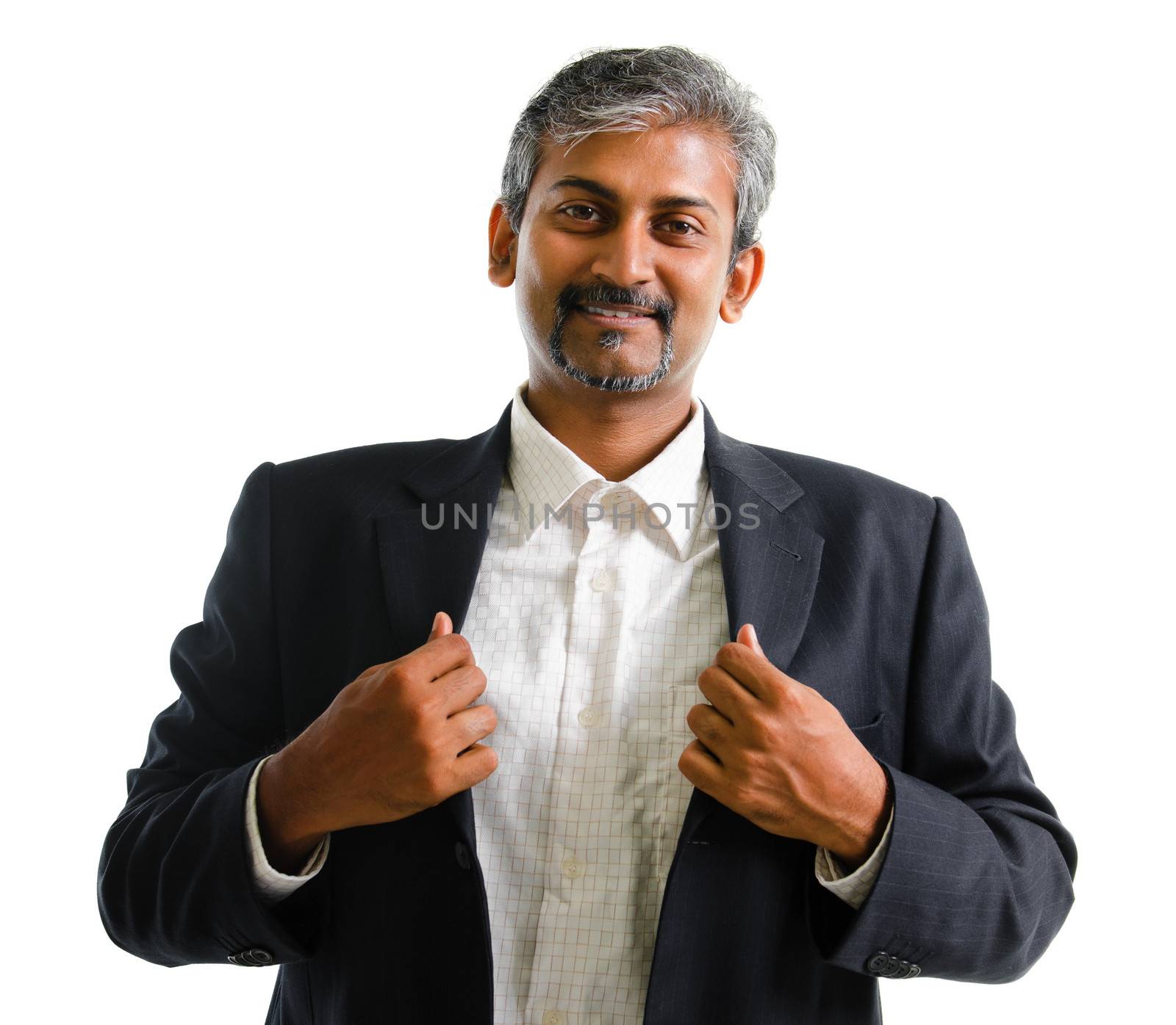 Good looking mature Asian Indian business man with business suit smiling isolated on white background. Portrait of handsome Indian male model.