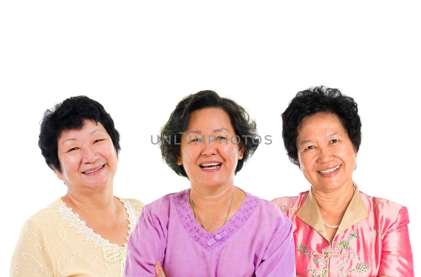 Group of seniors. Three Asian senior women smiling happily isolated on white background.