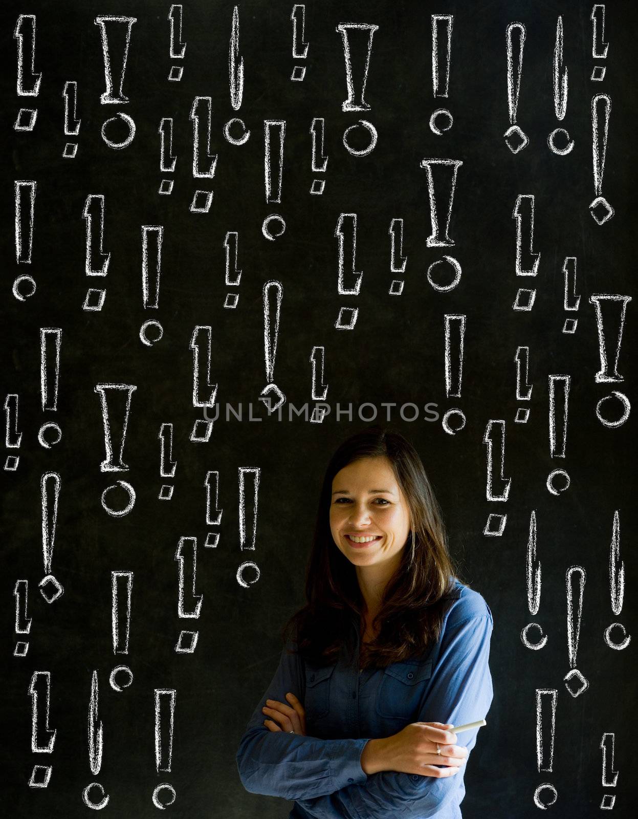 Businesswoman, student or teacher with chalk exclamation marks on blackboard background