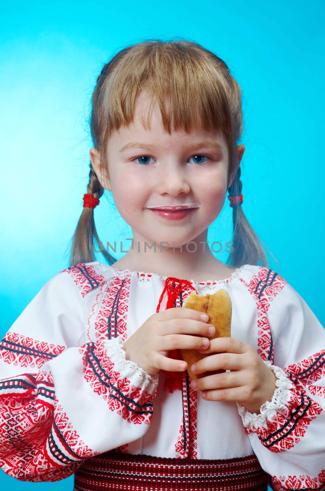 Russian little girl eats homemade pie