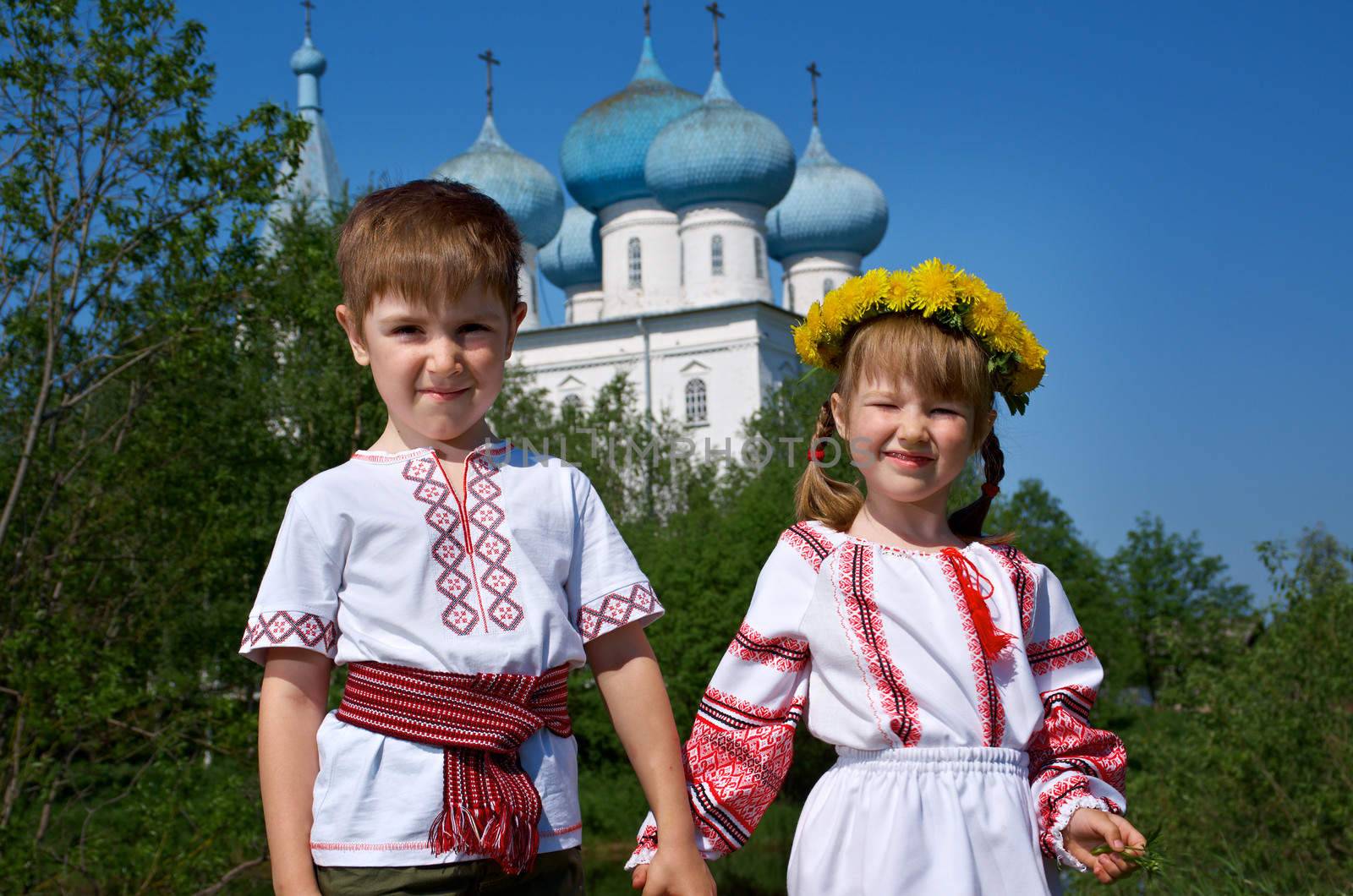  Russian Little boy and girl  on a orthodox church background