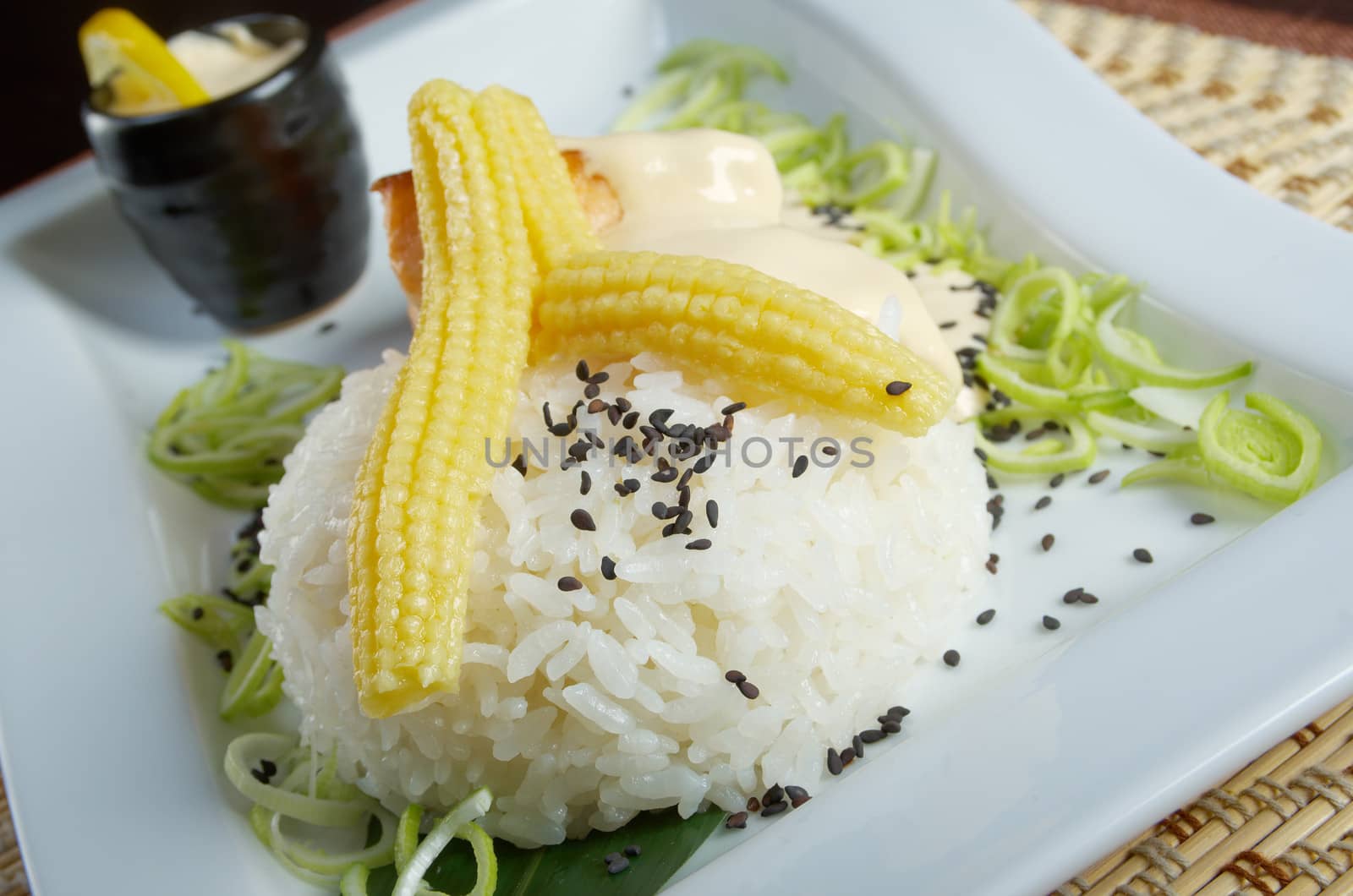 Japanese cuisine .White rice with chunks of vegetables.