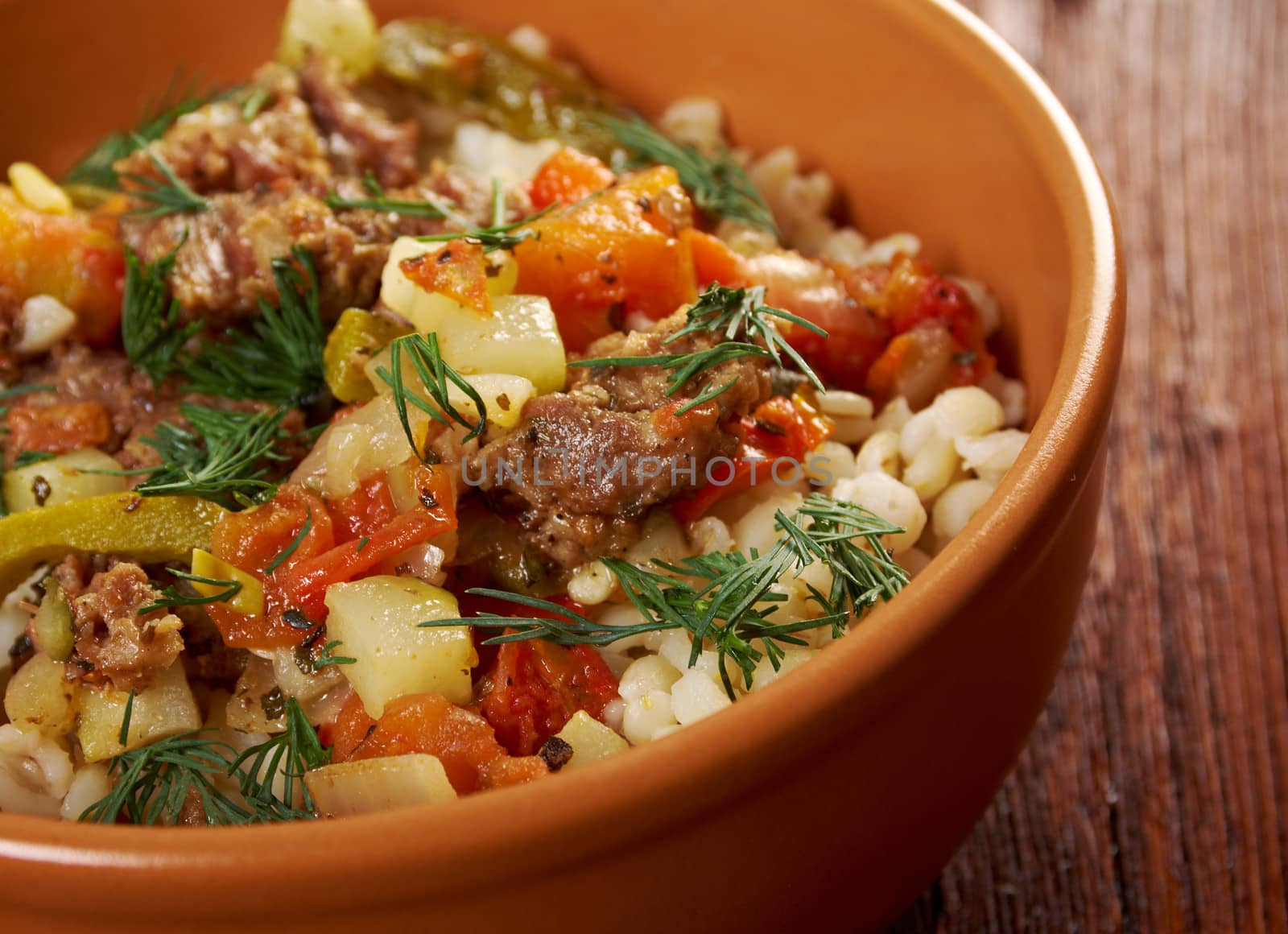 boiled pearl barley with meat and vegetable .farm-style 	country