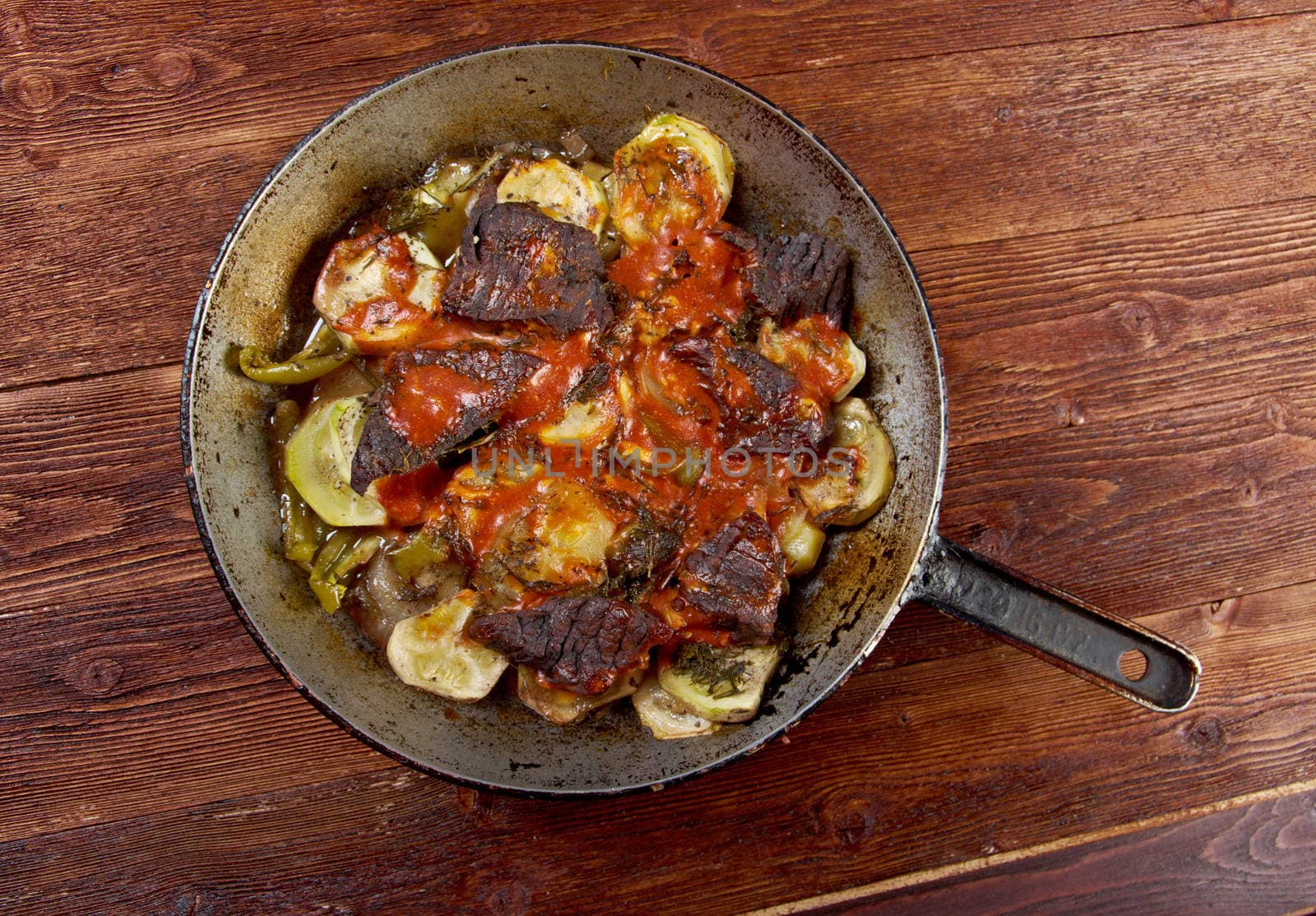  Beef Ragout with wine sauce and  vegetables on french.farm-style 