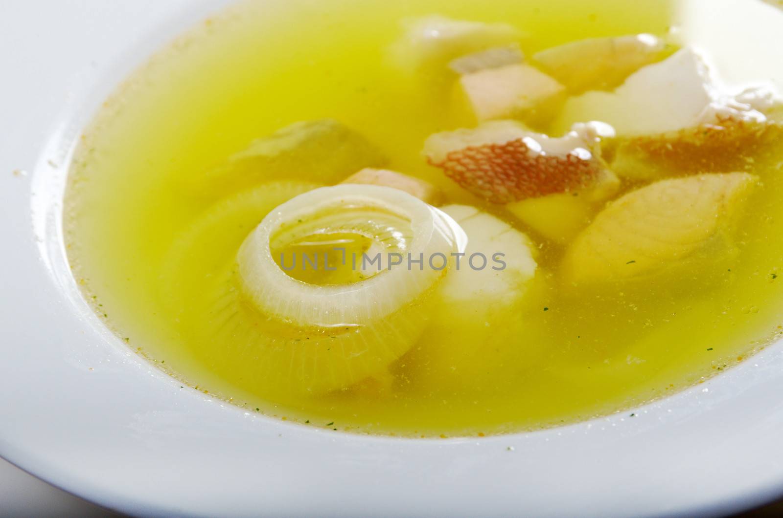 Ukha with sterlet , salmon . Russian homemade  traditional fish soup.