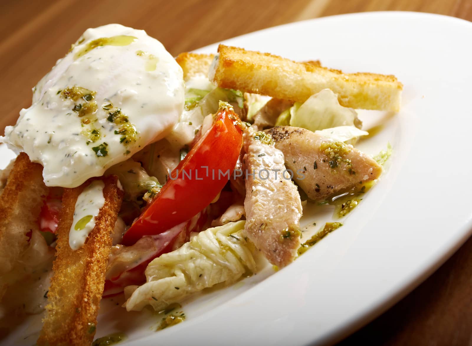 Grilled chicken fillet with mediterranean salad 