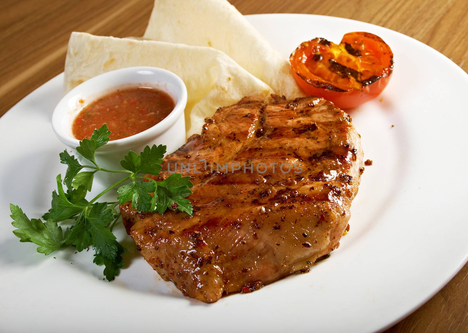 grilled t-bone steak and 	lavash