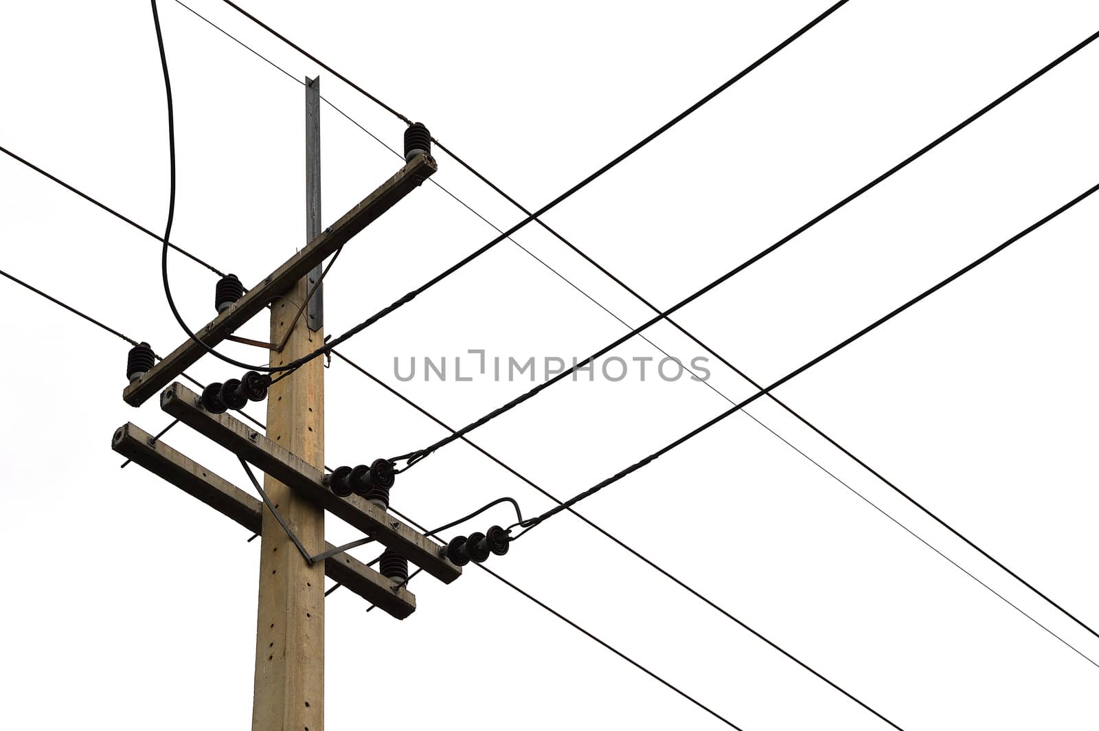 photo of an electric pole with a many cables by Lekchangply