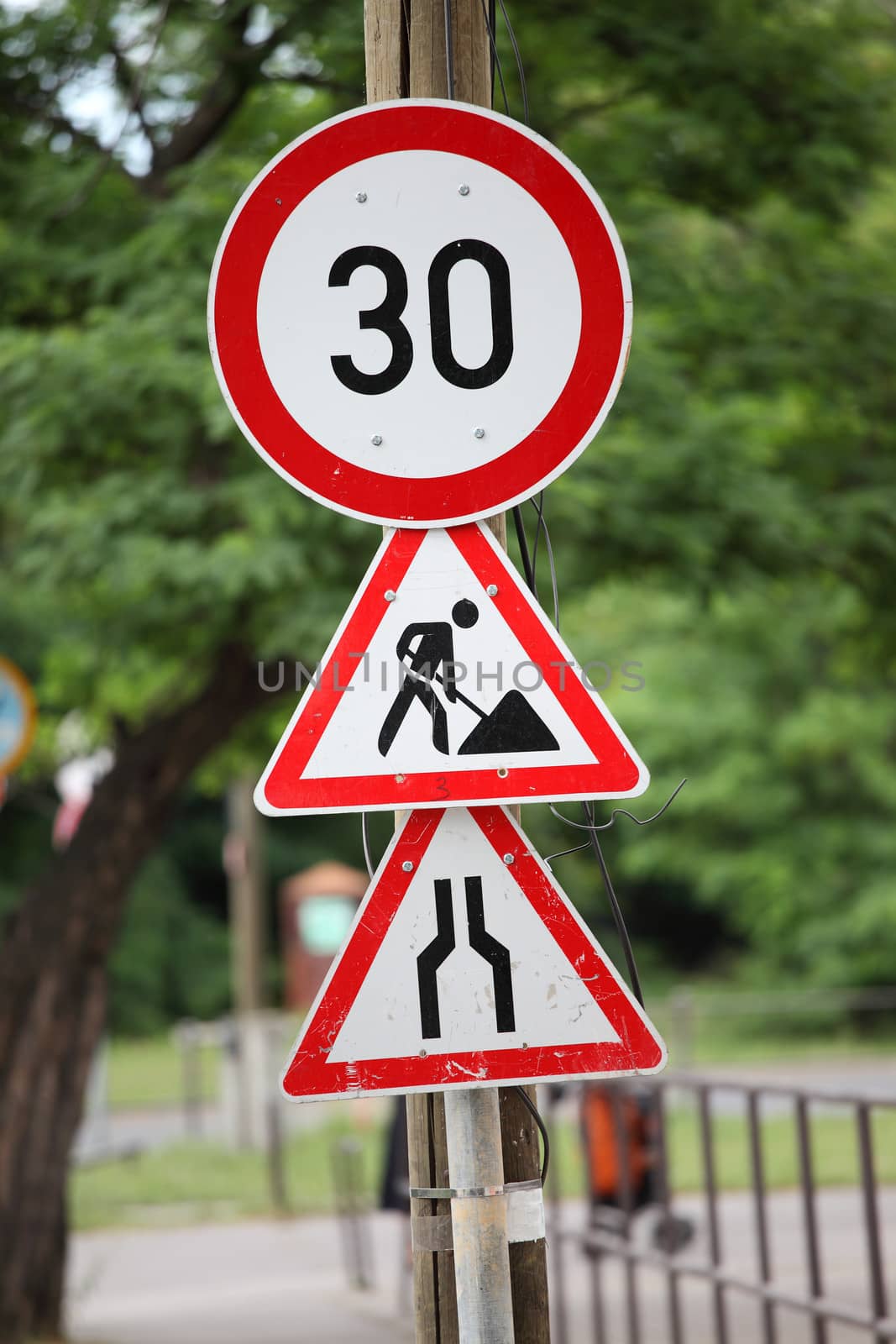 Traffic signs at a road construction site