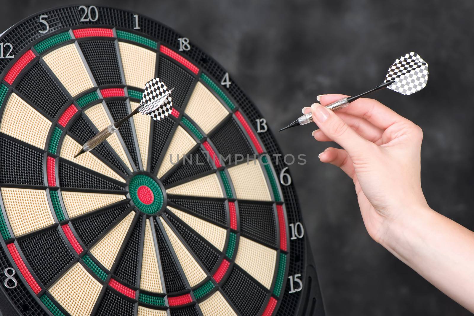 arrow in hand and dartboard by imarin