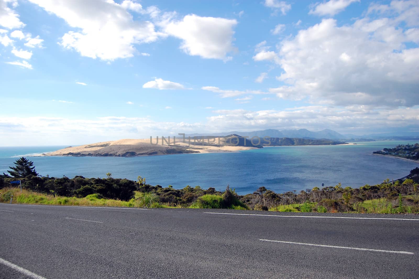 Sea bay view from asphalt road, North Island, New Zealand