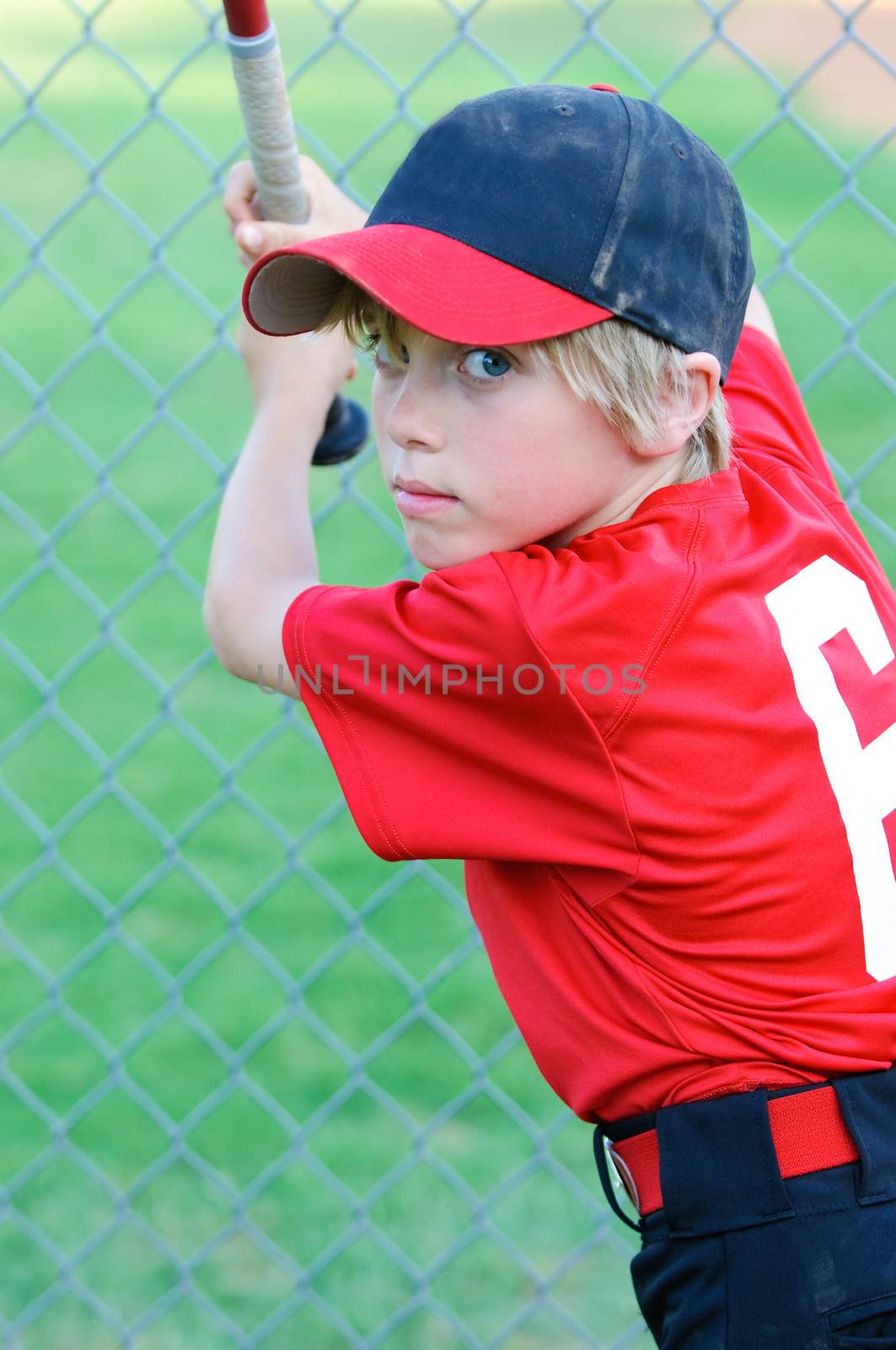 Portrait of Little league baseball player.